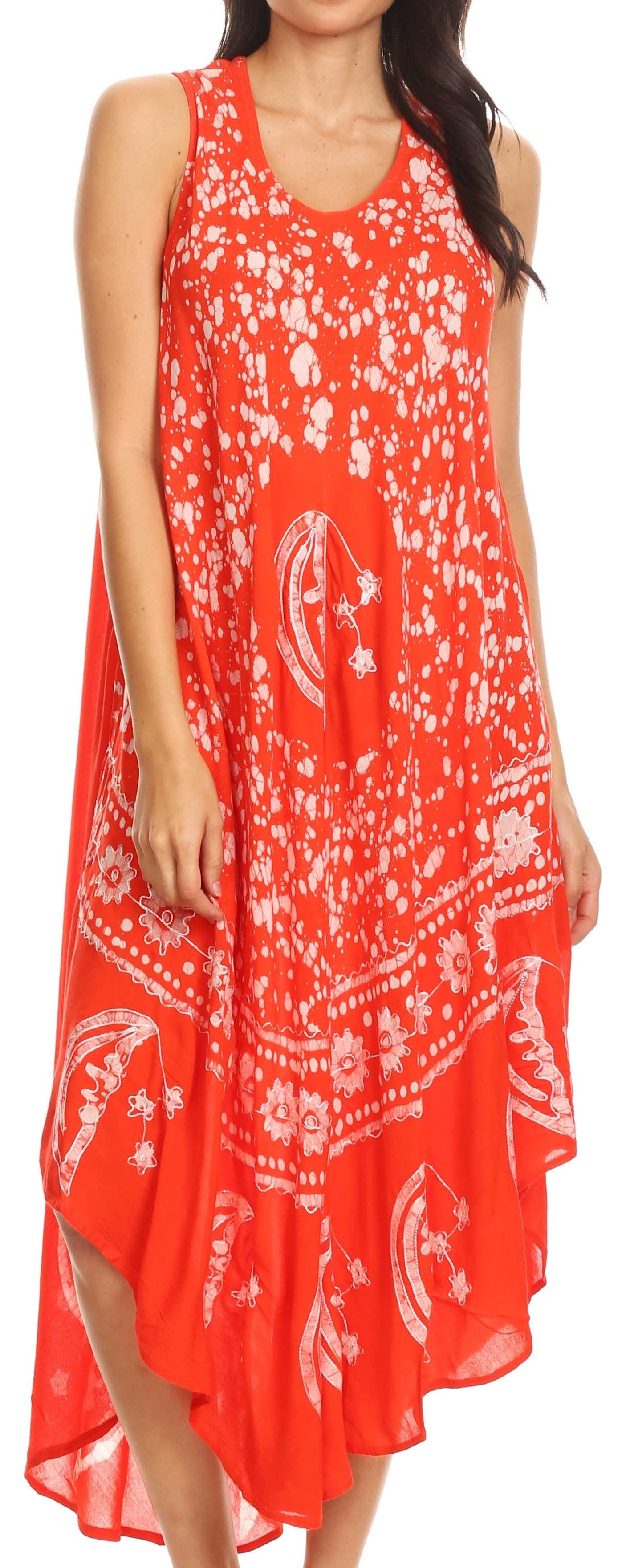 Red dress with white patterns on a model against a neutral background