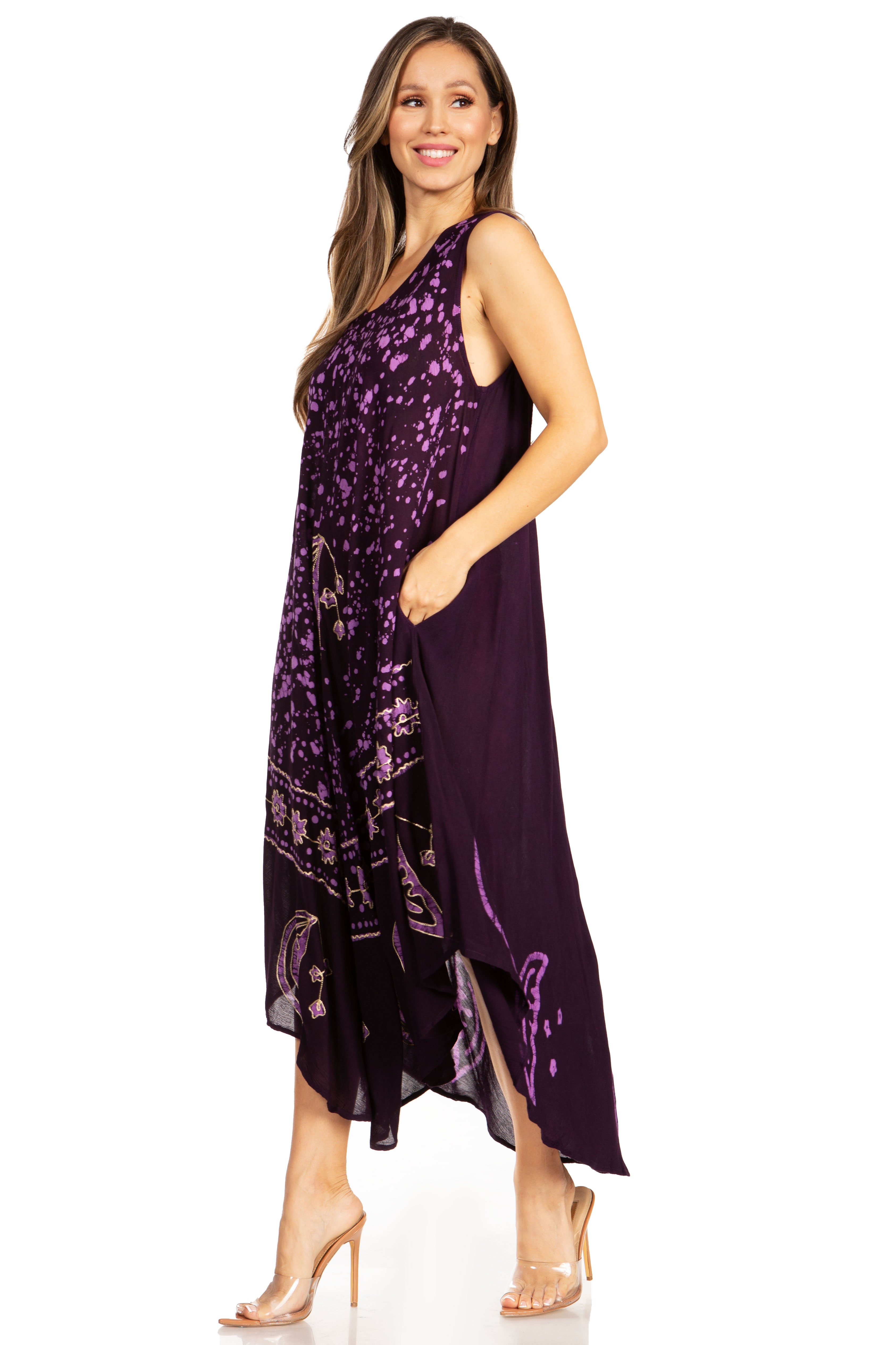 Woman wearing a purple dress with a patterned overlay on a white background
