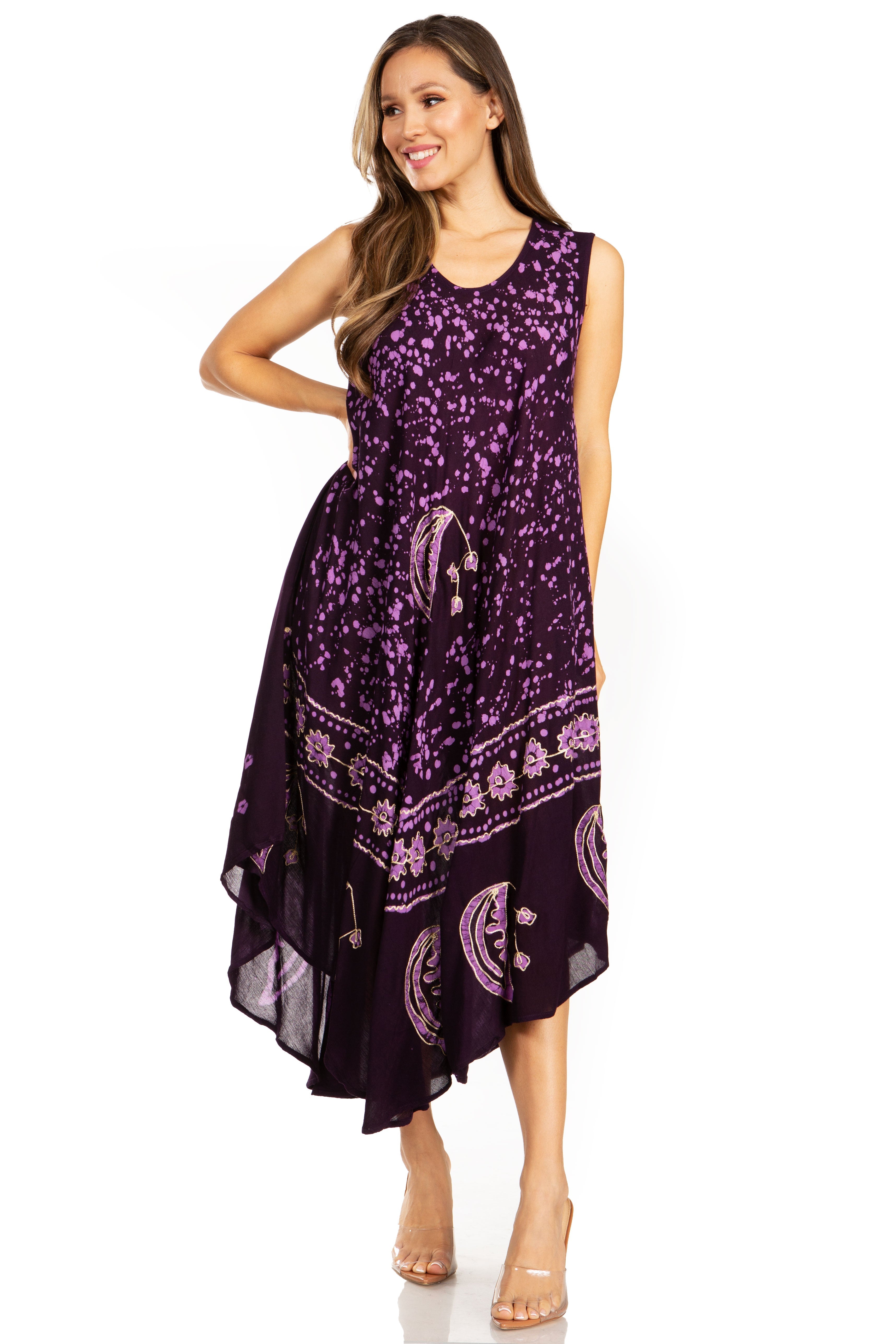 Woman wearing a purple floral dress on a white background