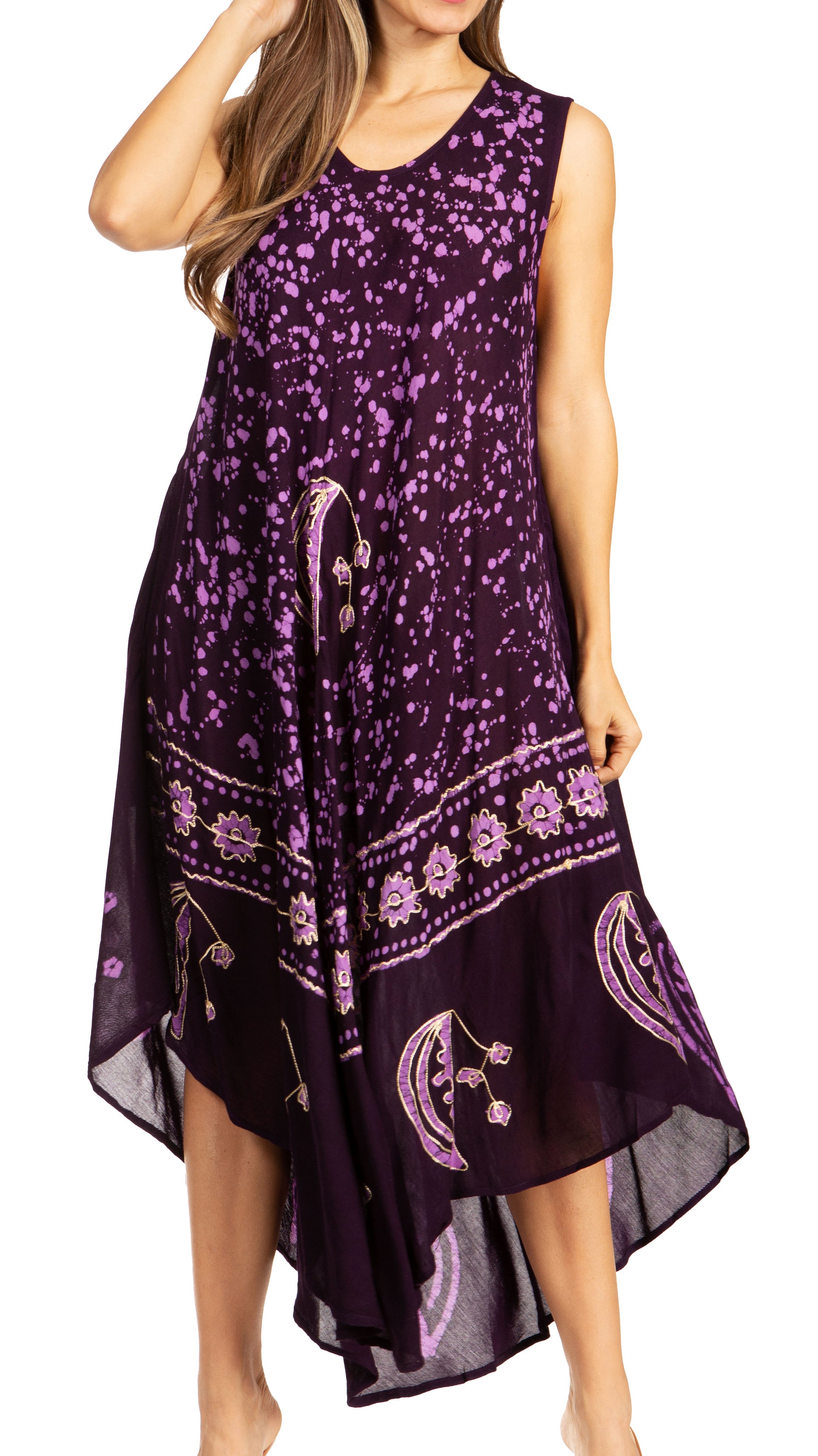 Purple floral patterned dress worn by a model on a white background