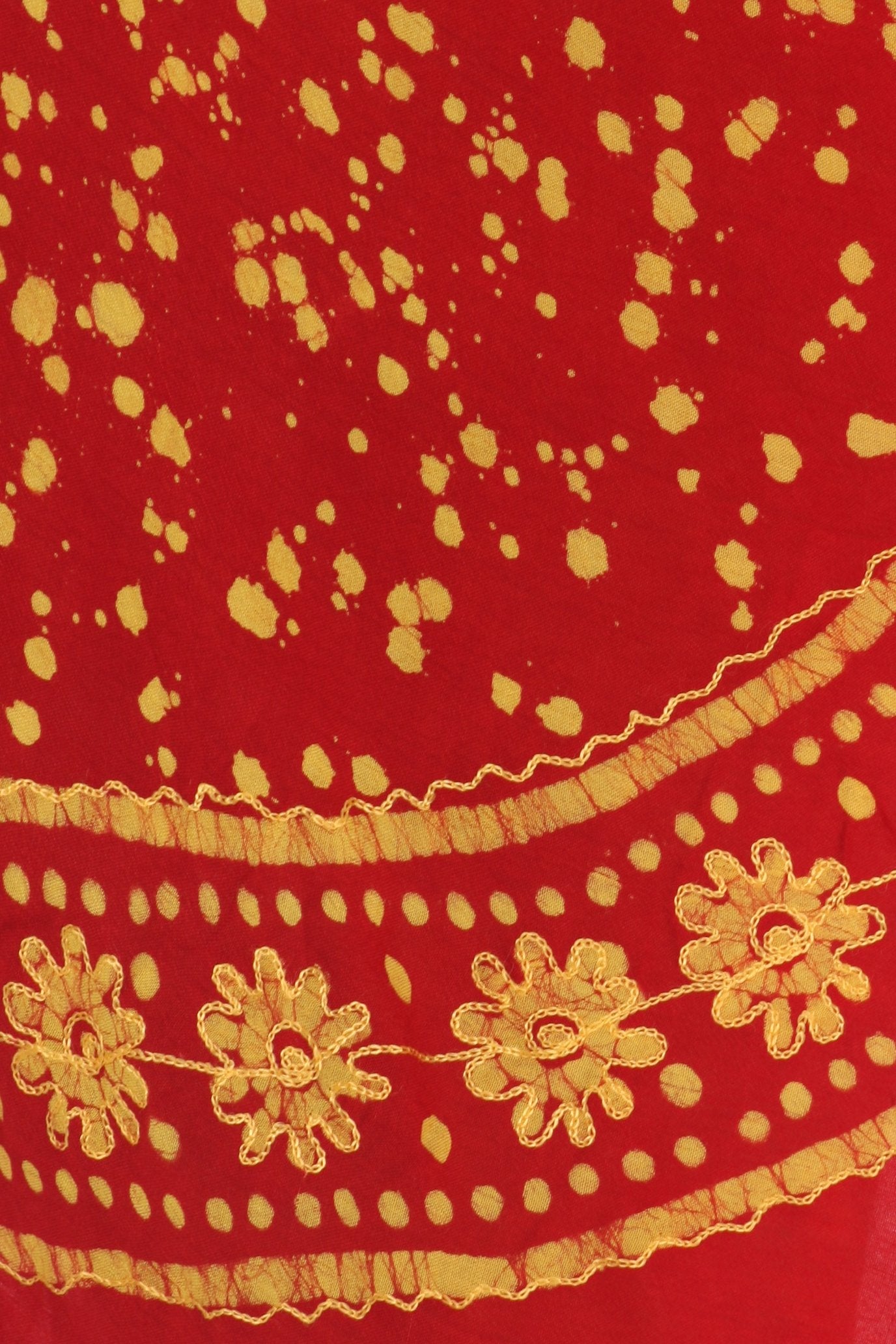 Red fabric with gold floral patterns