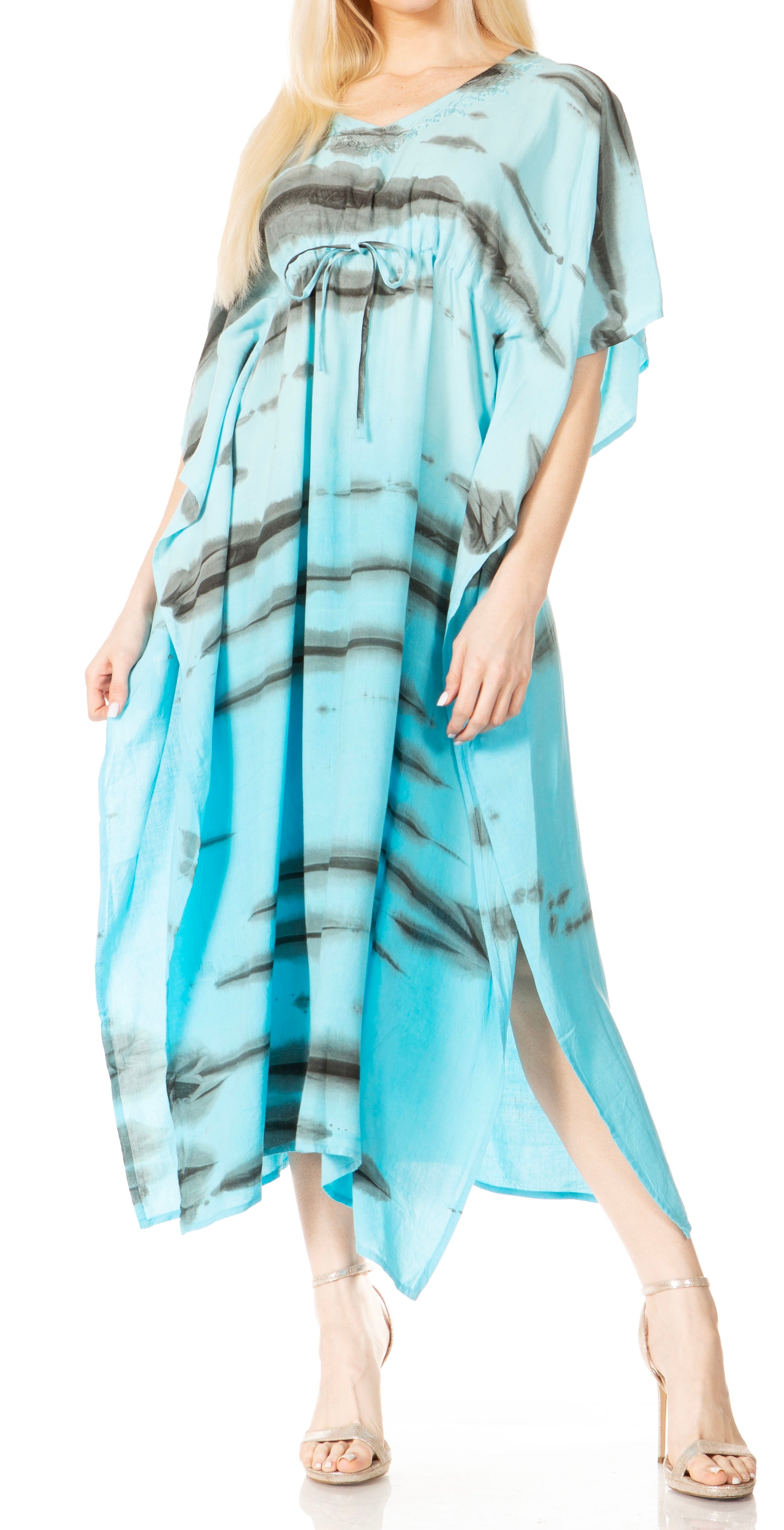 Woman wearing a blue and gray patterned dress on a white background