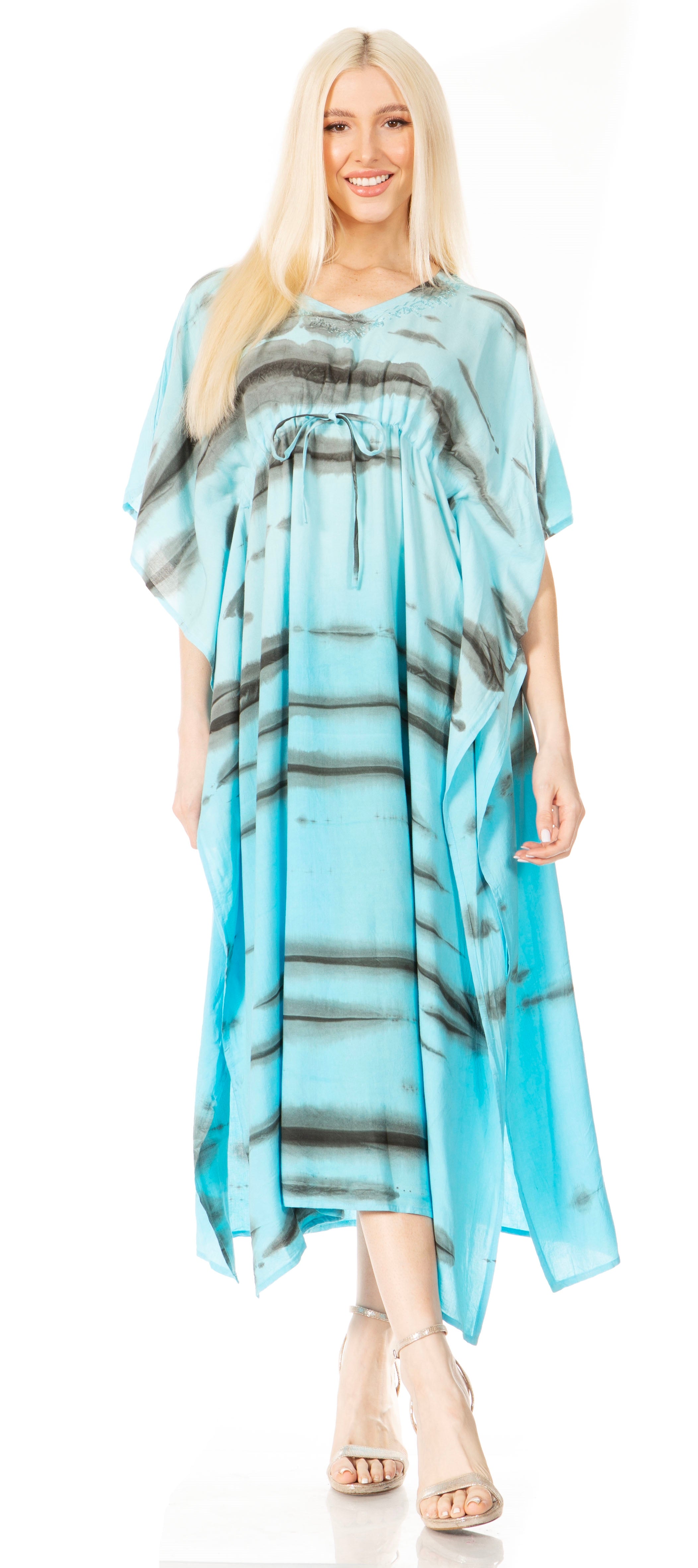 Woman wearing a blue and gray patterned dress on a white background