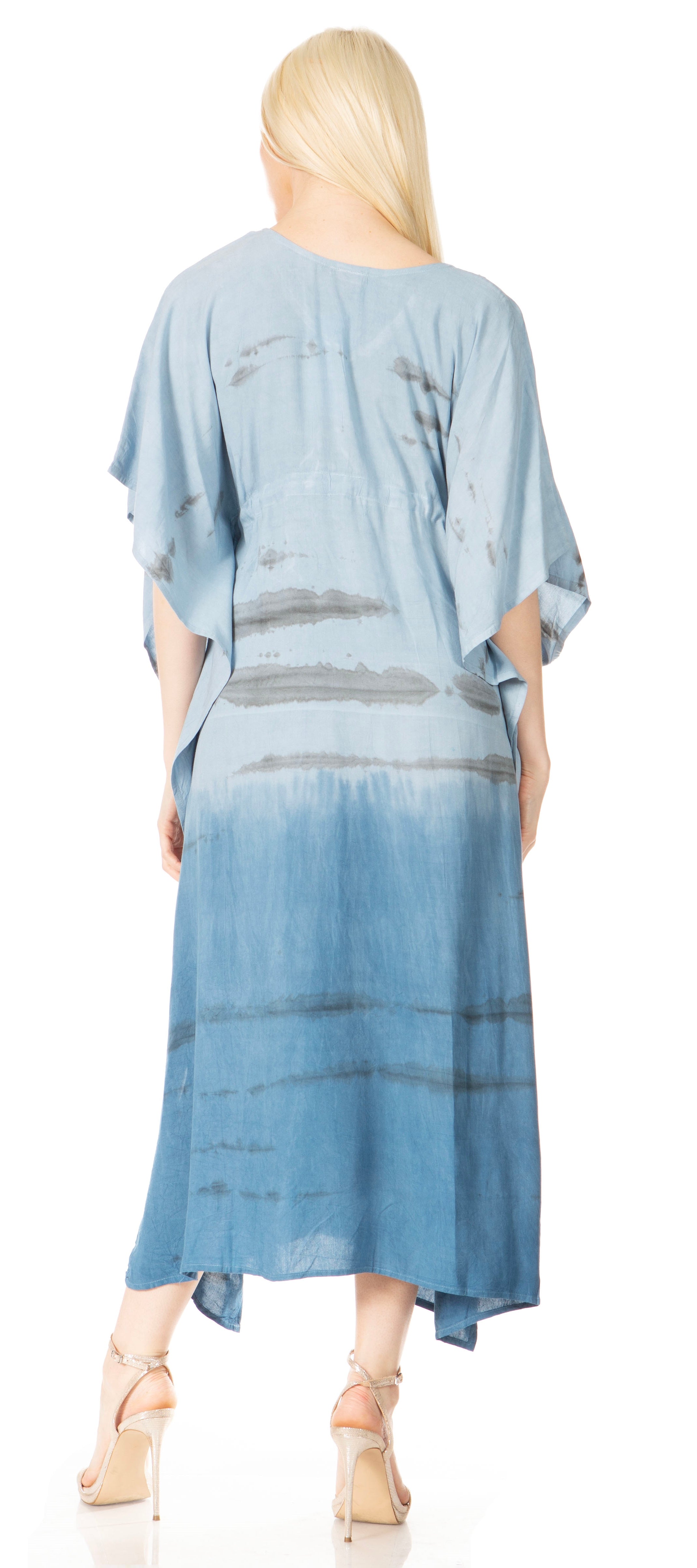 Woman wearing a blue gradient dress with a white background