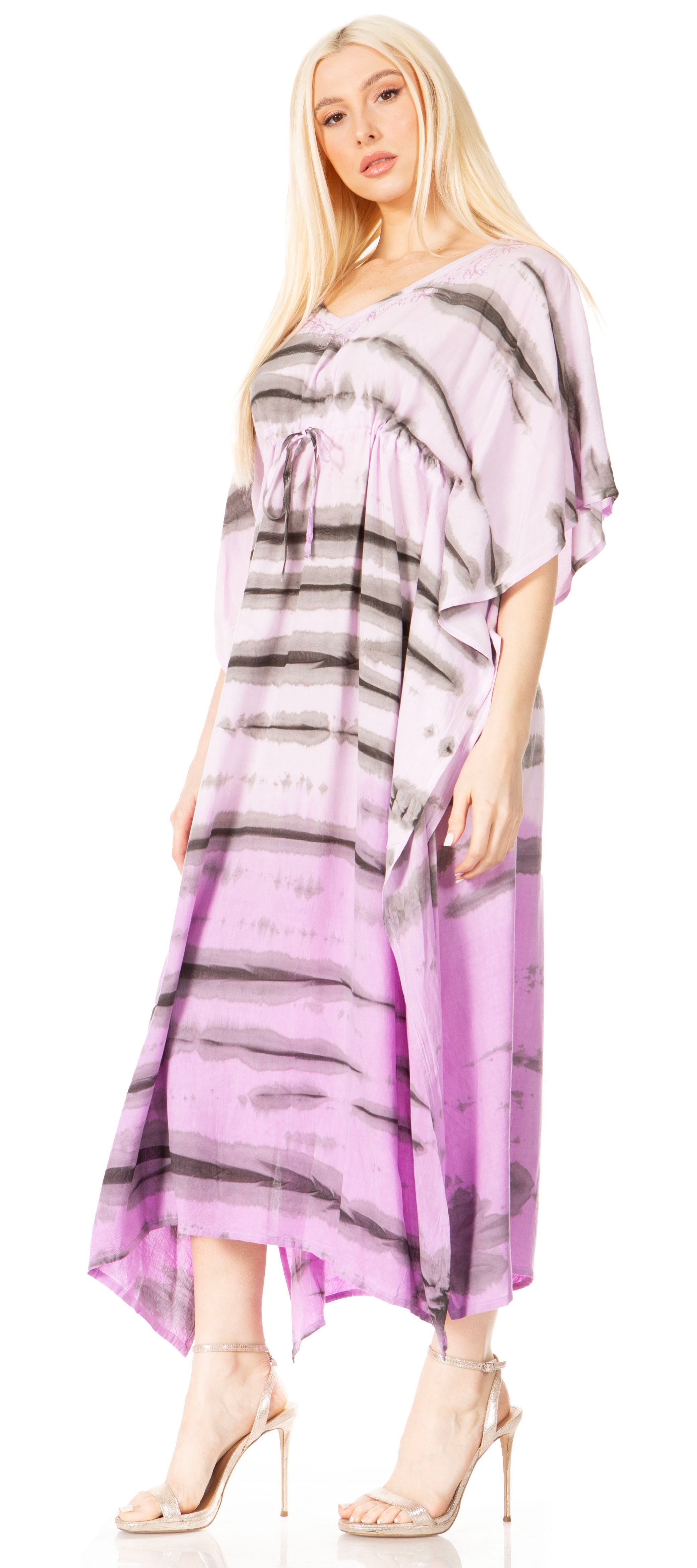 Woman wearing a purple and gray patterned dress on a white background