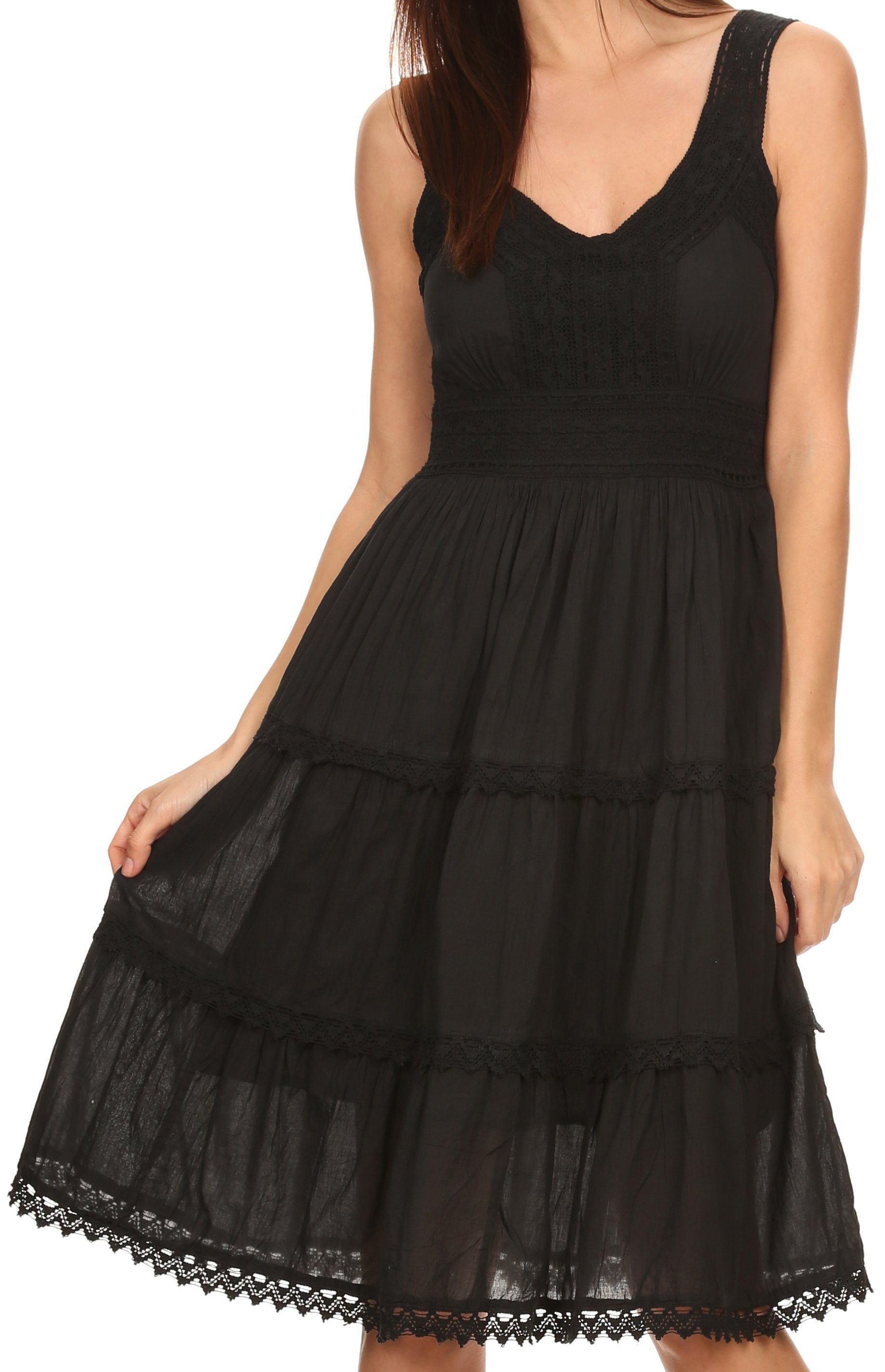 Black dress with lace details on a white background