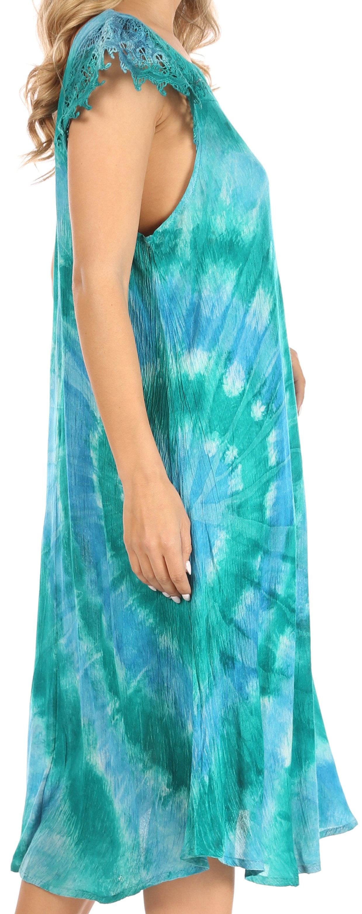 Teal tie-dye dress with lace details on a white background