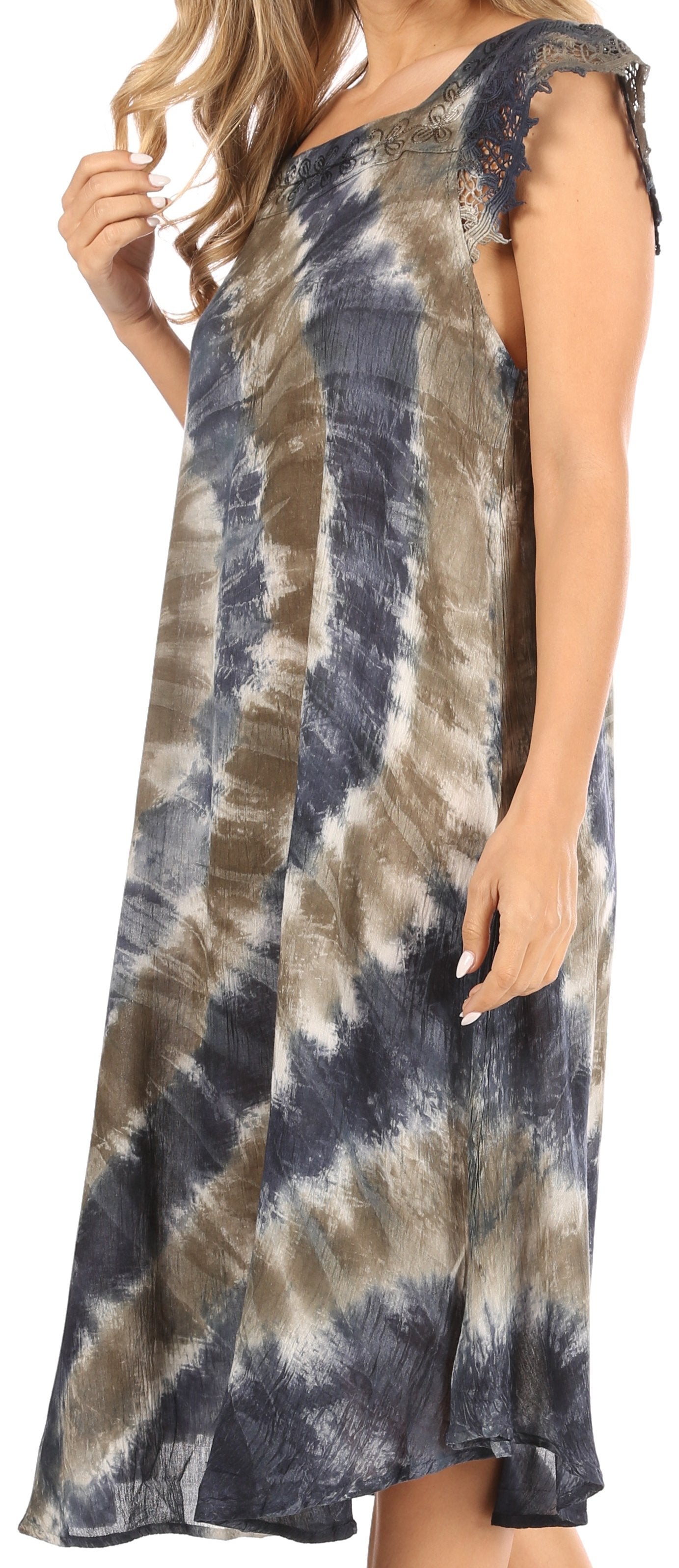 Long tie-dye dress with a pattern of blue, brown, and white on a person.
