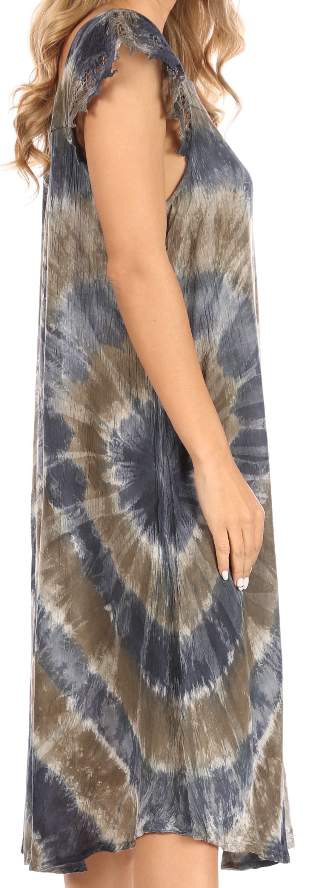 Tie-dye dress with a sleeveless design, worn by a person.