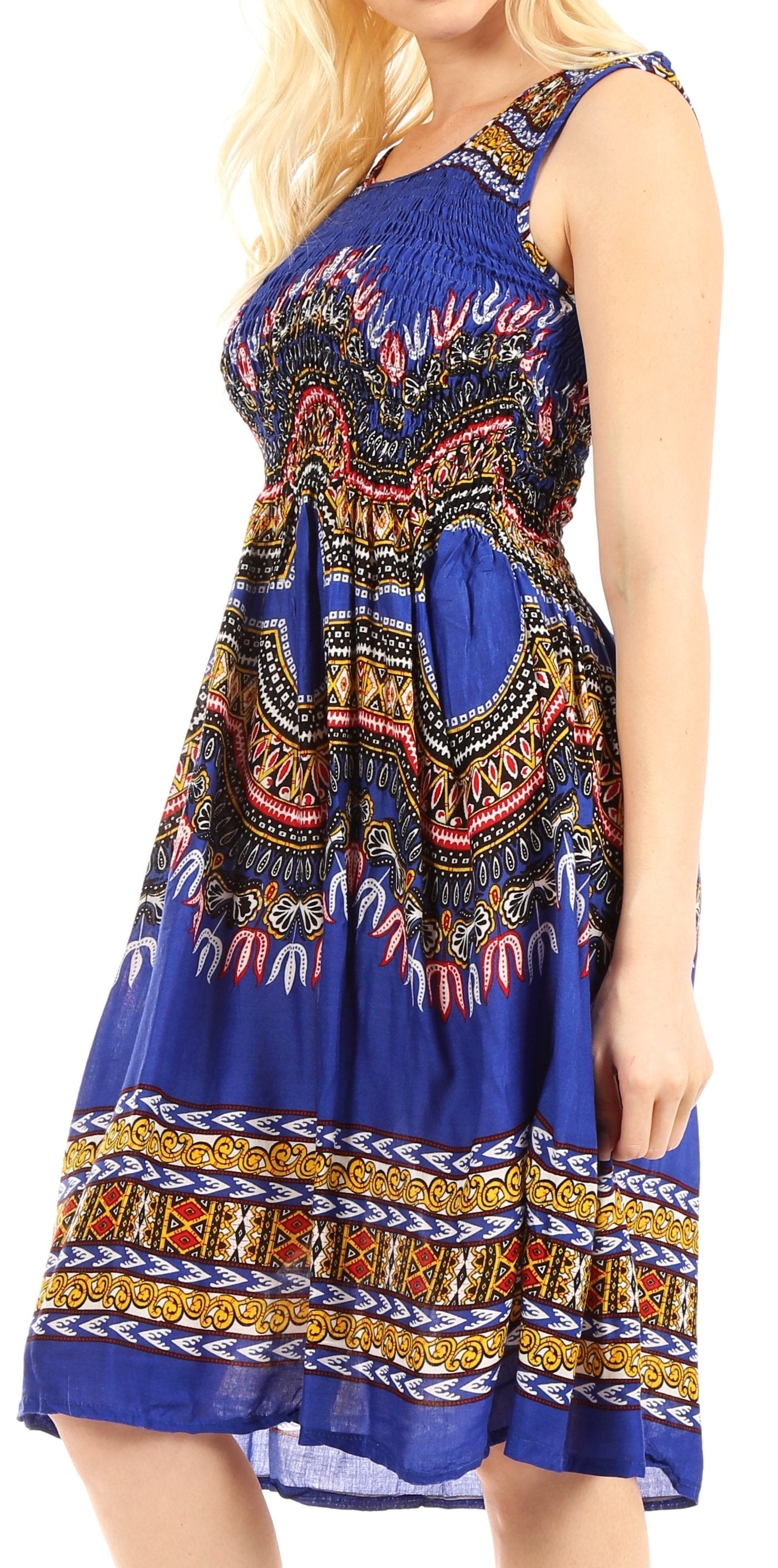 Woman wearing a colorful patterned dress on a white background