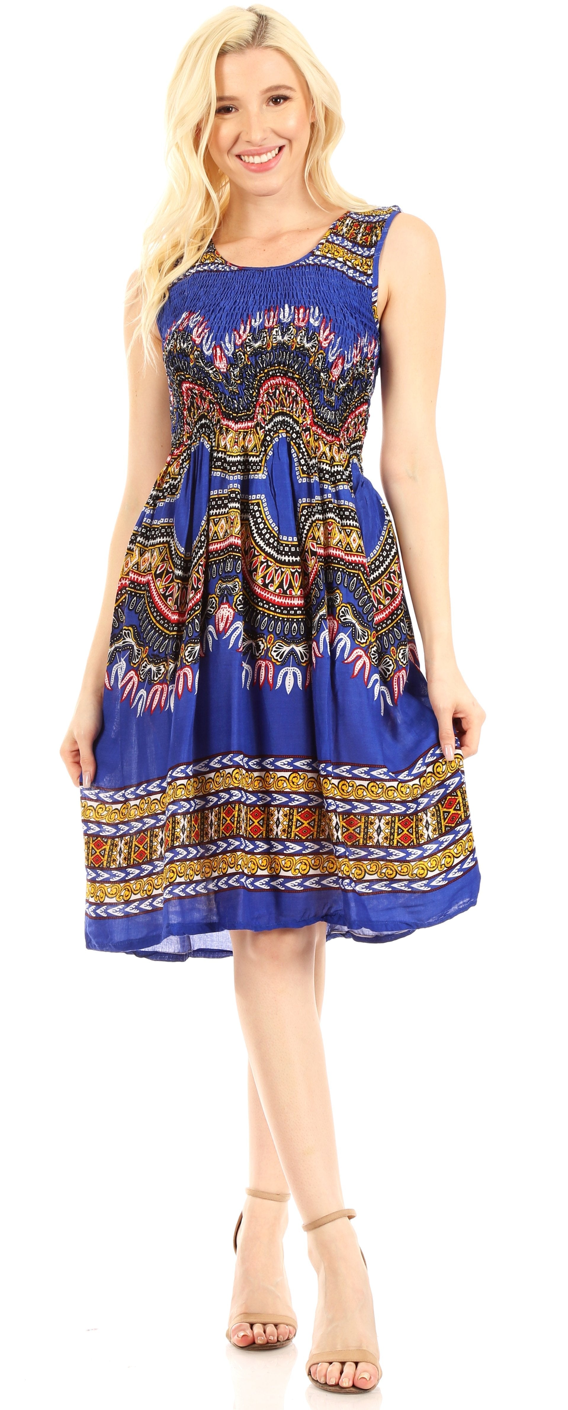 Woman wearing a colorful patterned dress on a white background