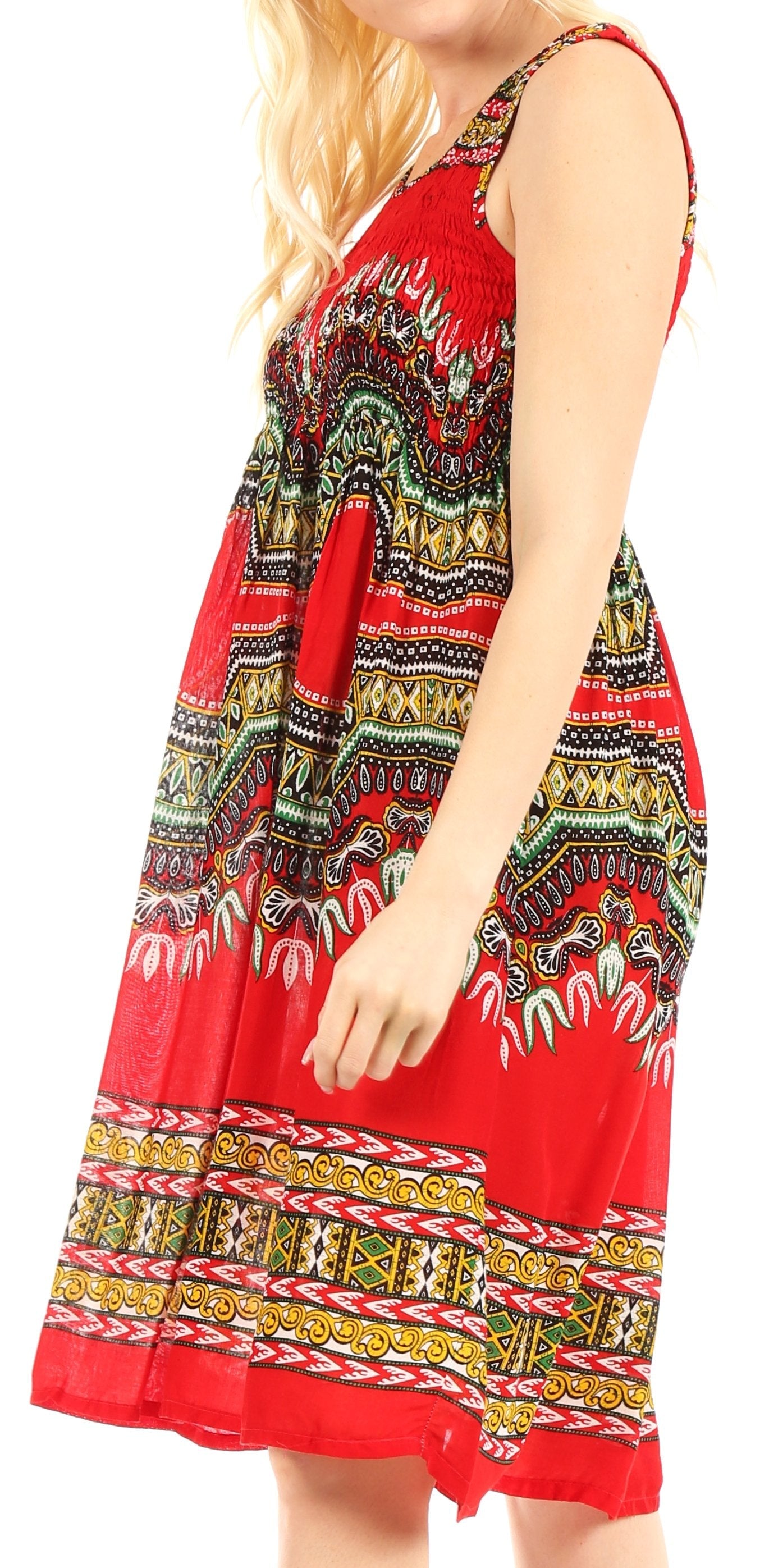 Red patterned dress worn by a person on a white background