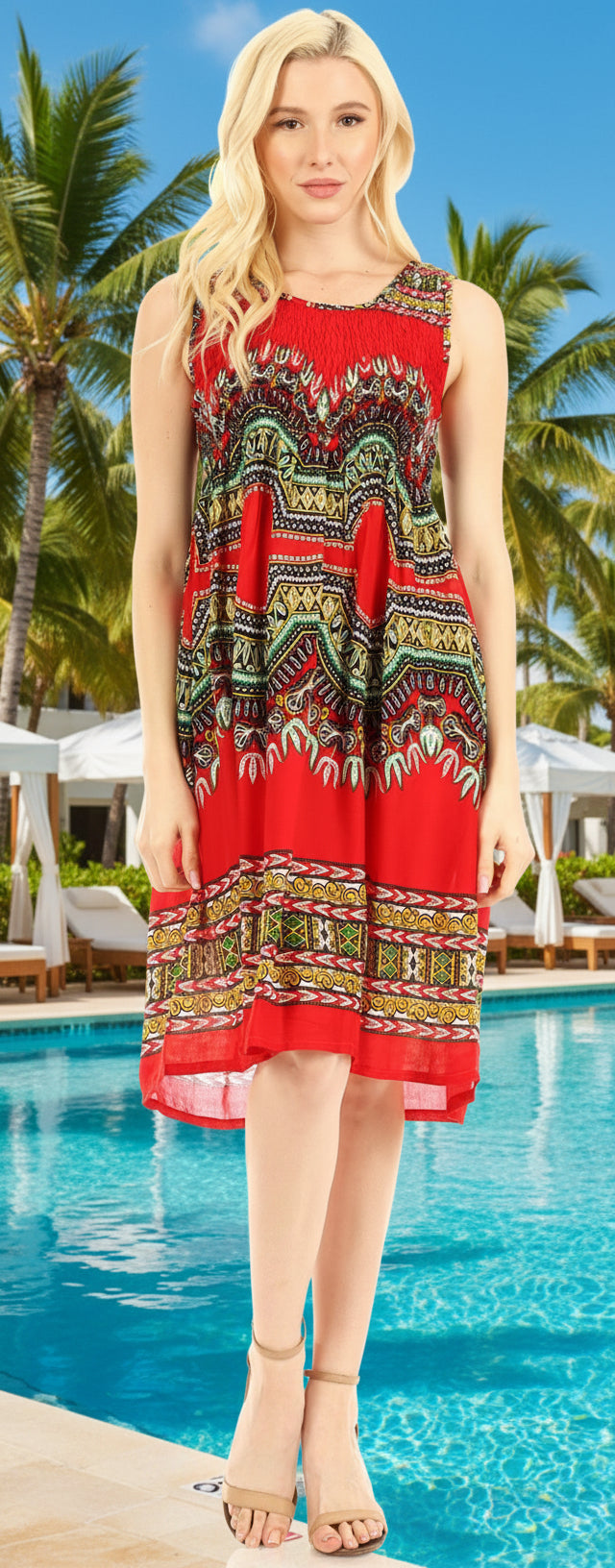 Woman wearing a red patterned dress against a white background