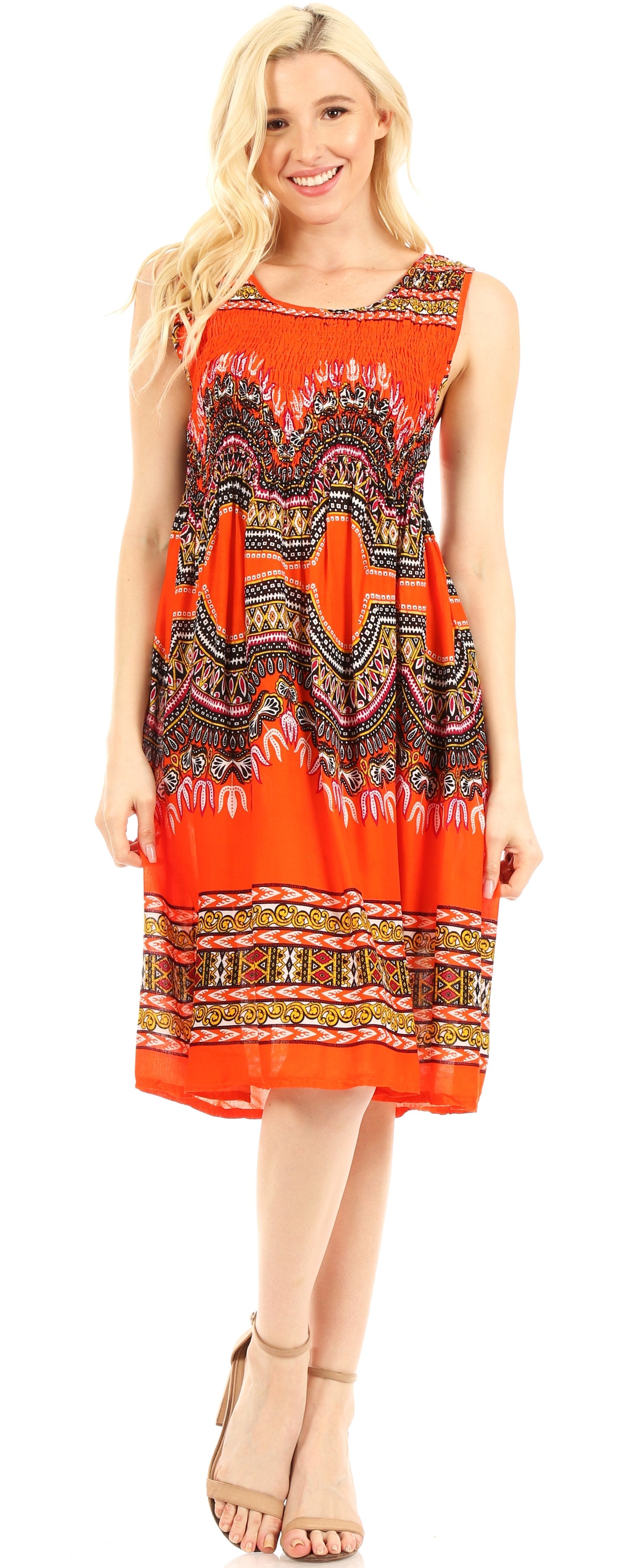 Woman wearing a colorful patterned dress on a white background