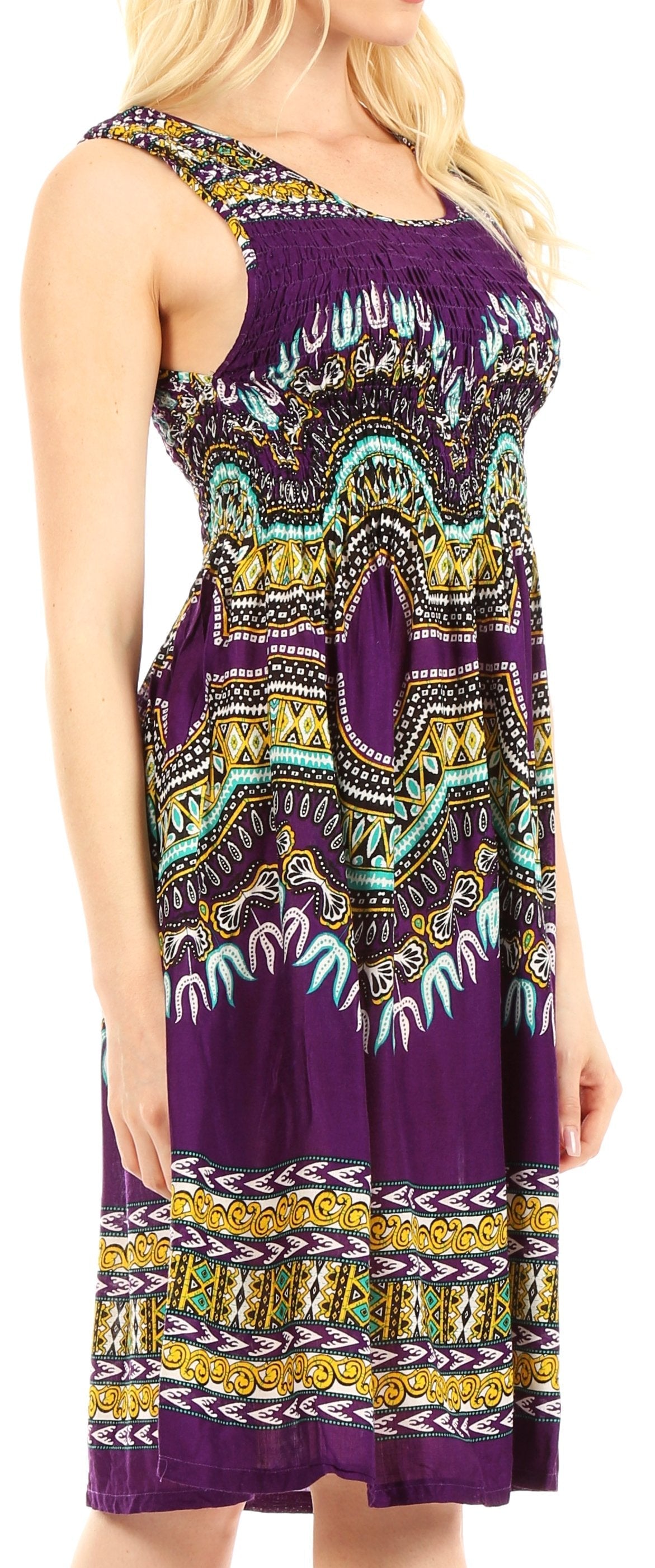 Woman wearing a purple dress with a colorful pattern