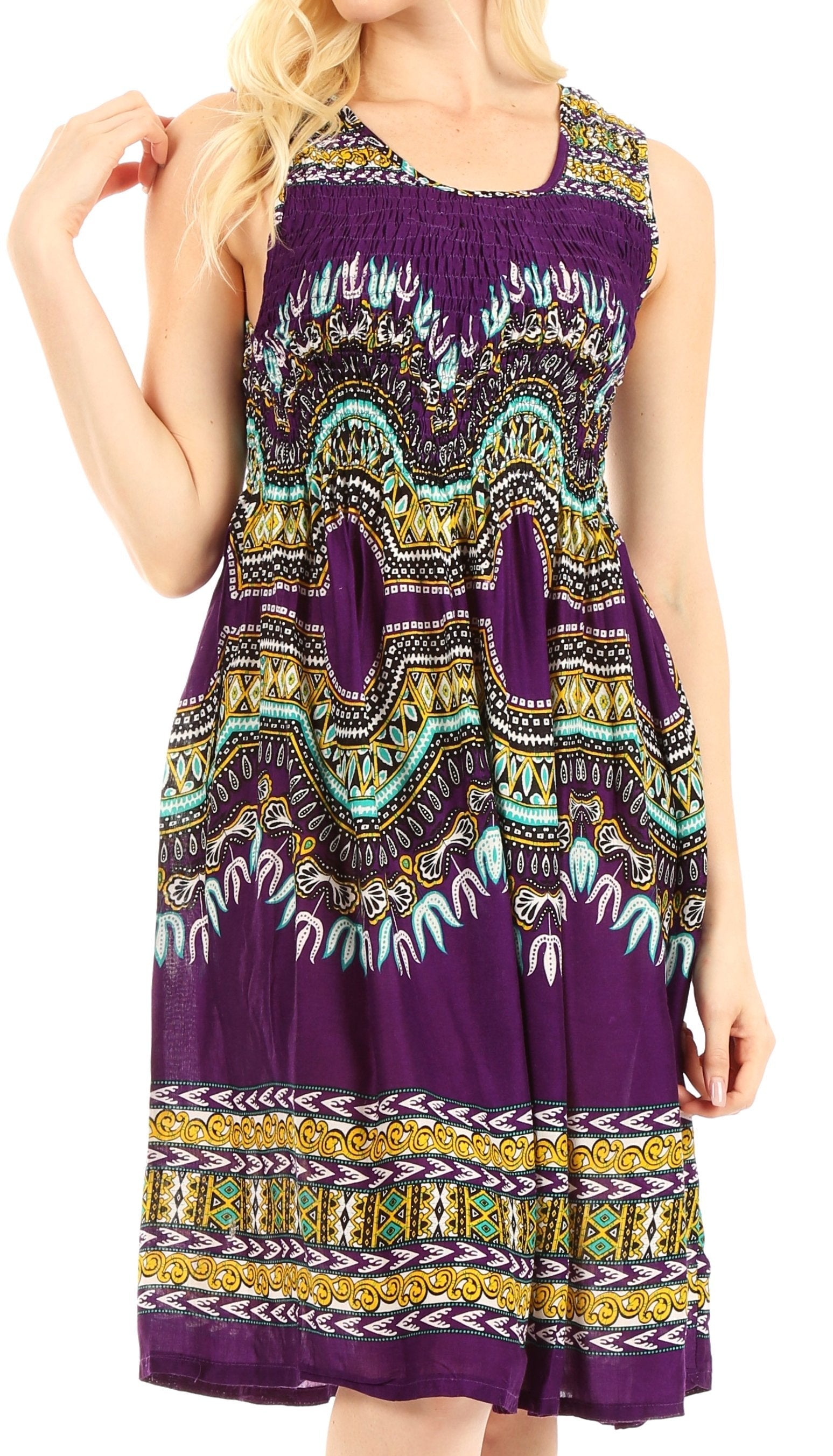 Woman wearing a purple dress with a colorful geometric pattern on a white background