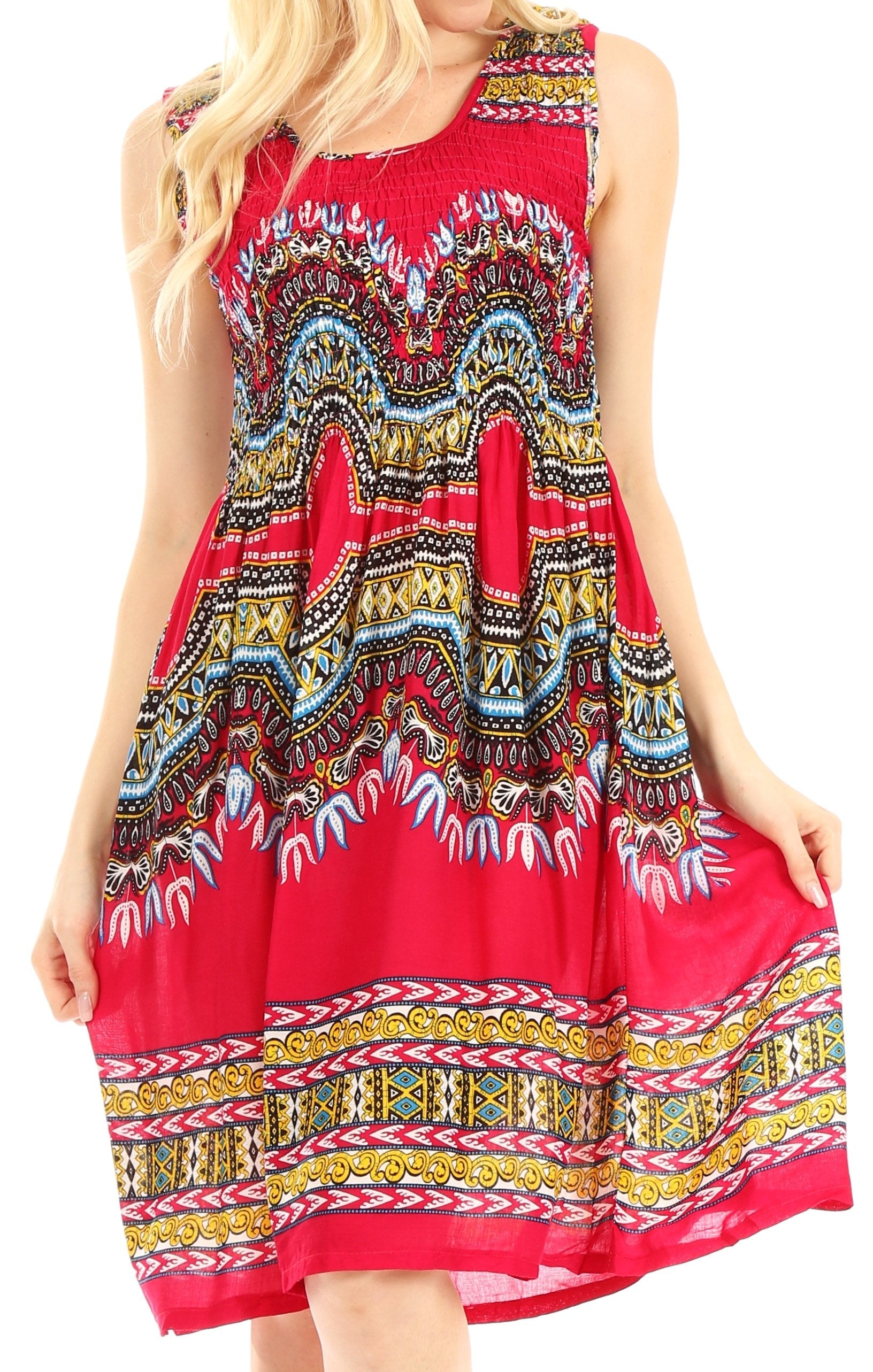 Woman wearing a red dress with colorful geometric pattern on a white background