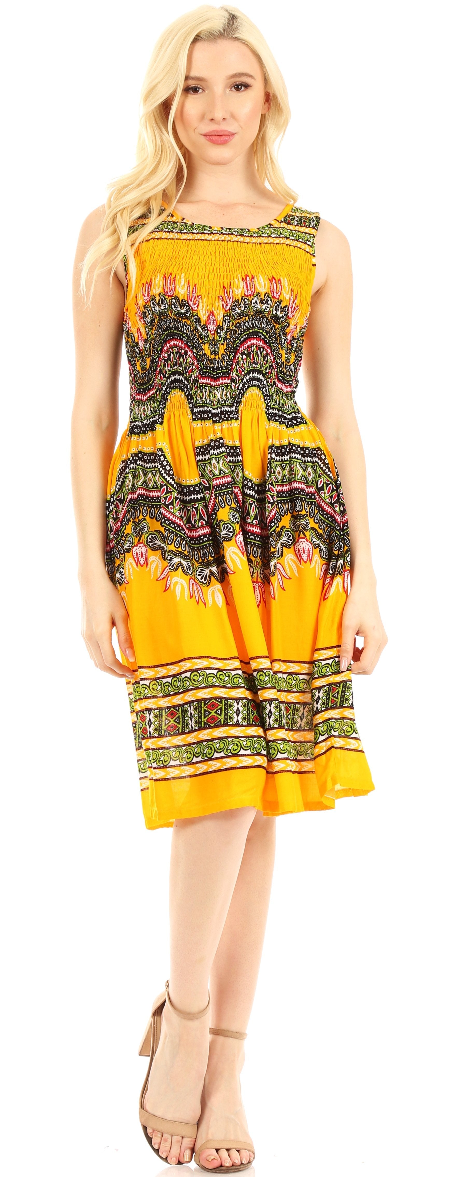 Woman wearing a yellow dress with a pattern on a white background