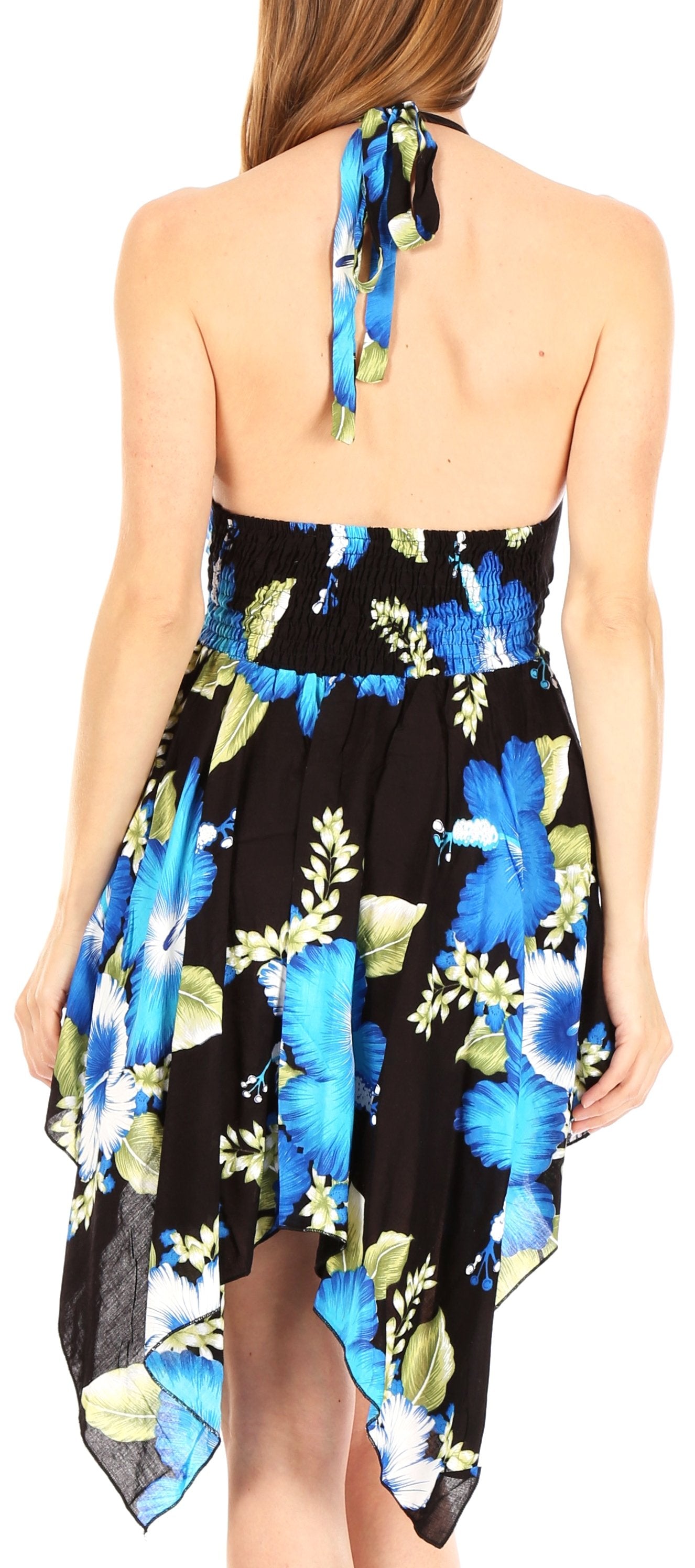 Woman wearing a floral dress with a black background