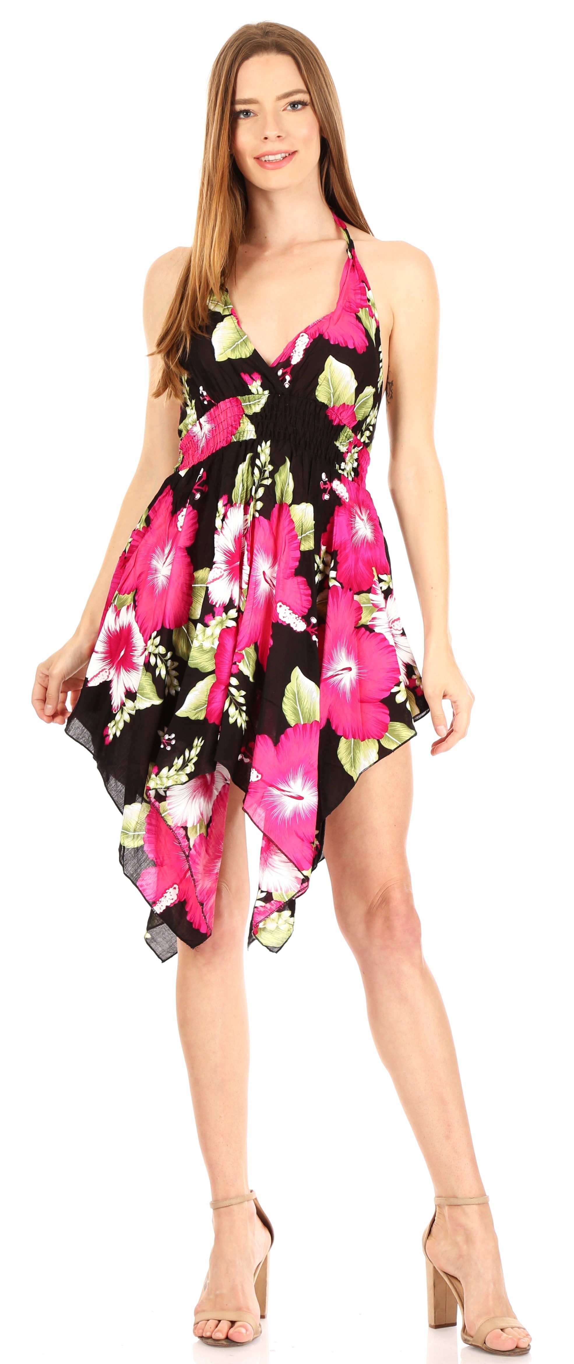 Woman wearing a floral dress with a black background