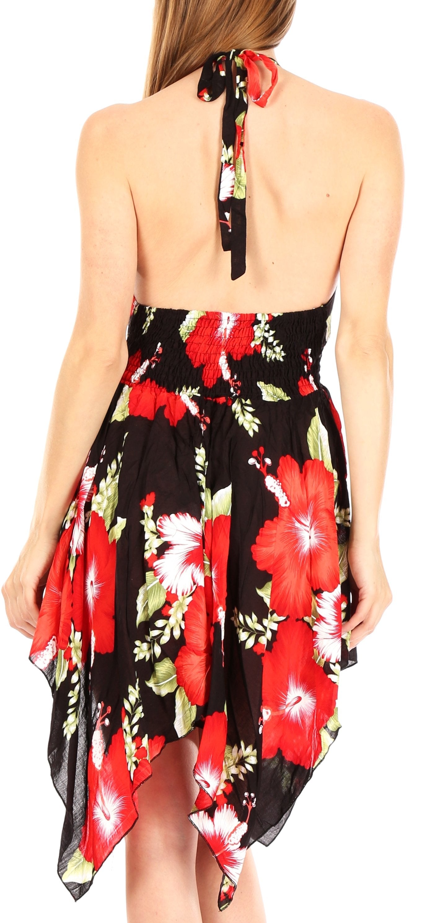 Woman wearing a floral dress with a black background
