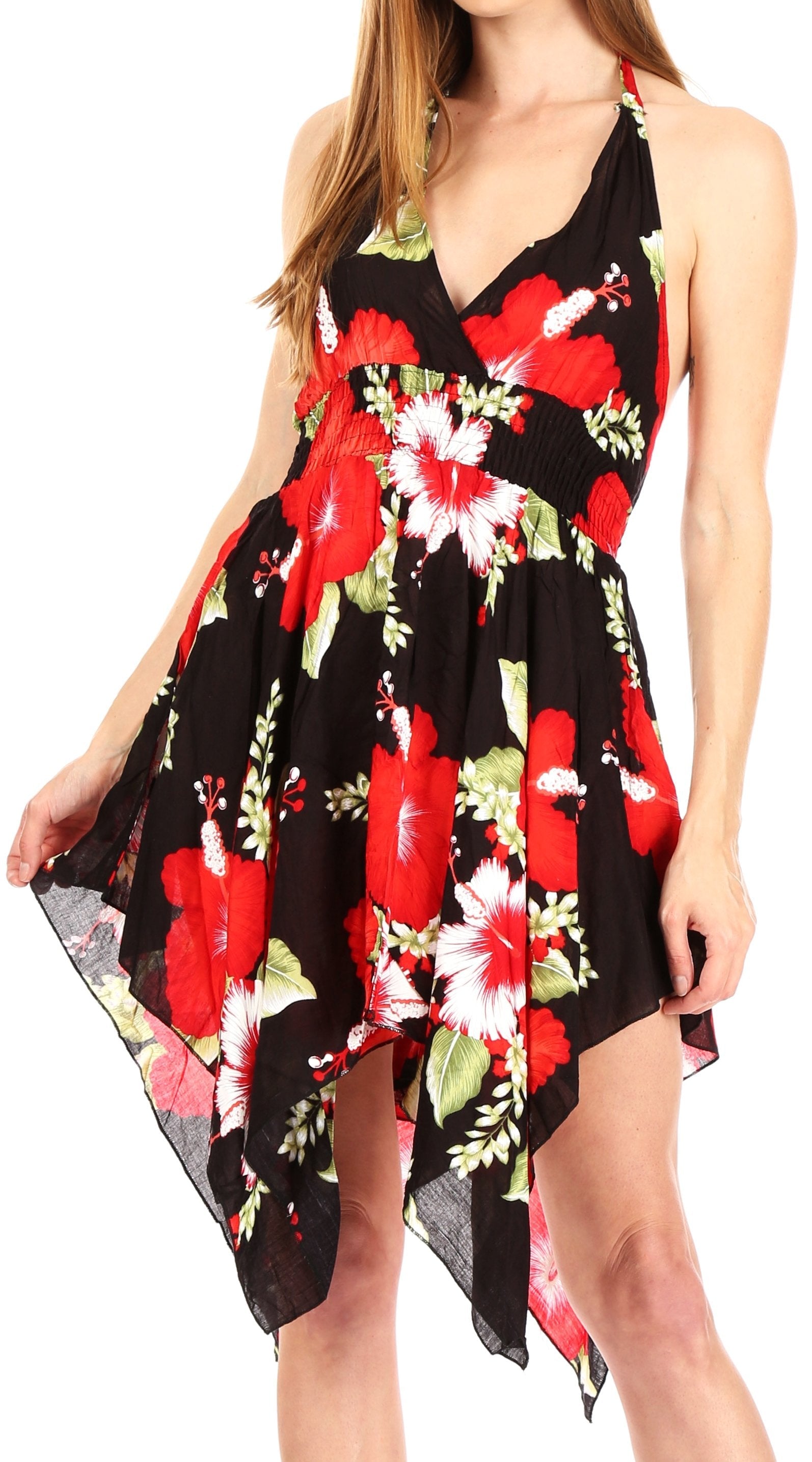 Woman wearing a black halter dress with red floral pattern on a white background