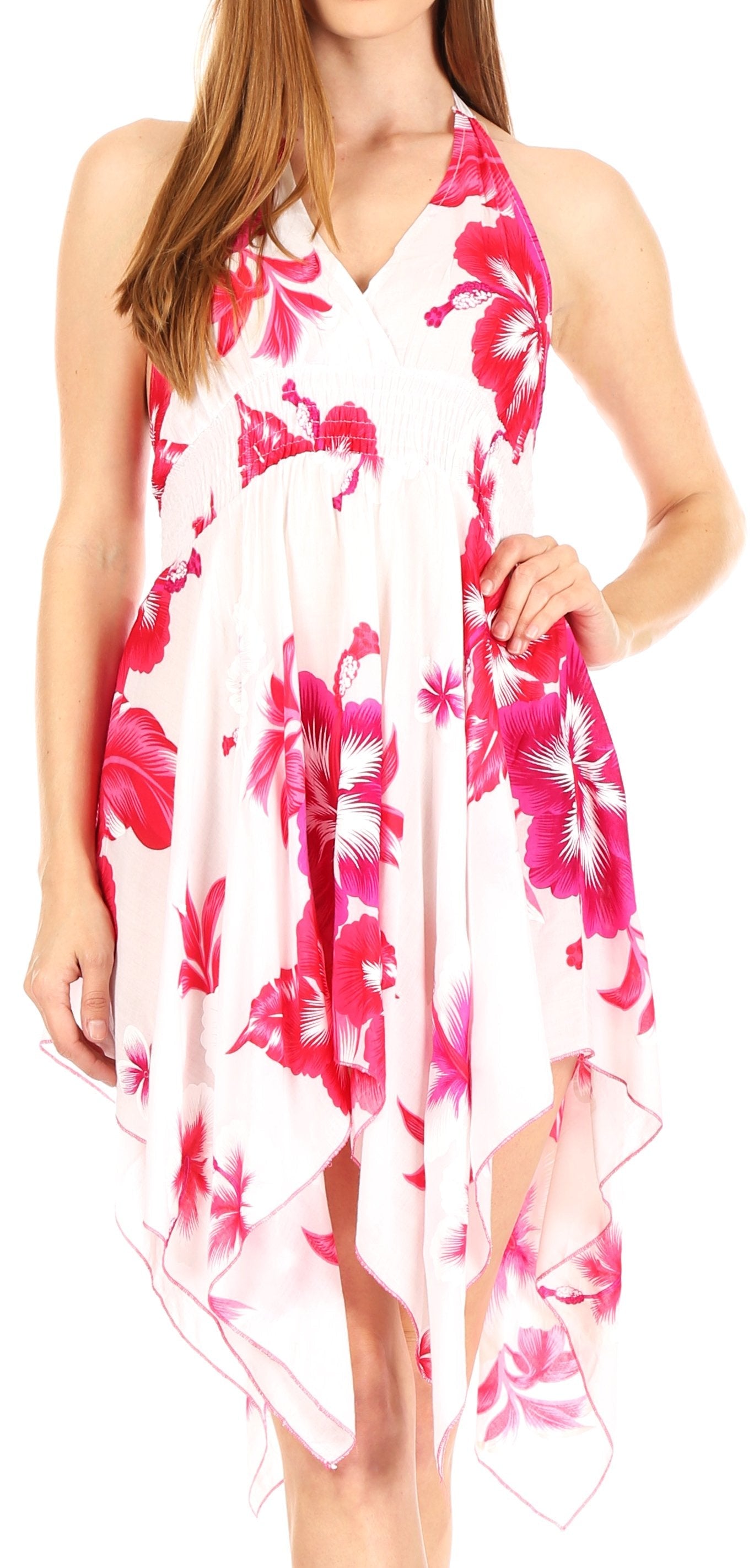 Woman wearing a floral dress with pink and white flowers on a white background