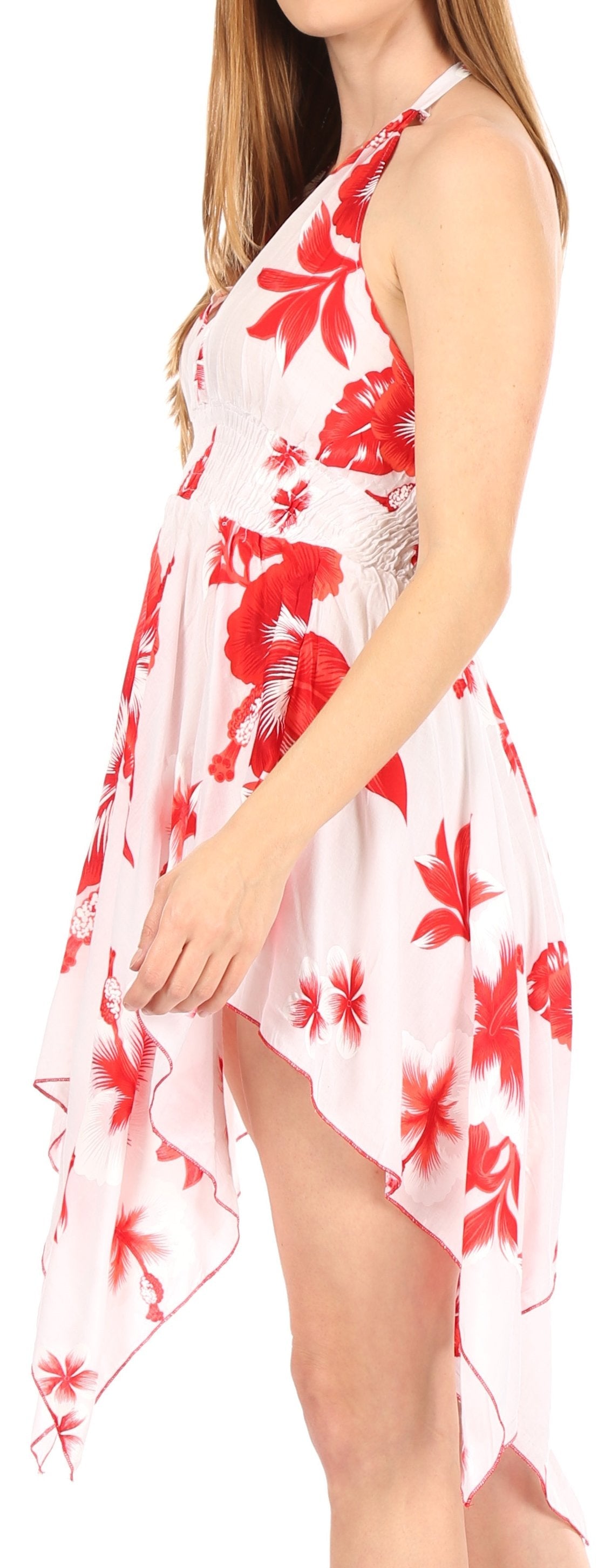 Woman wearing a white dress with red floral pattern