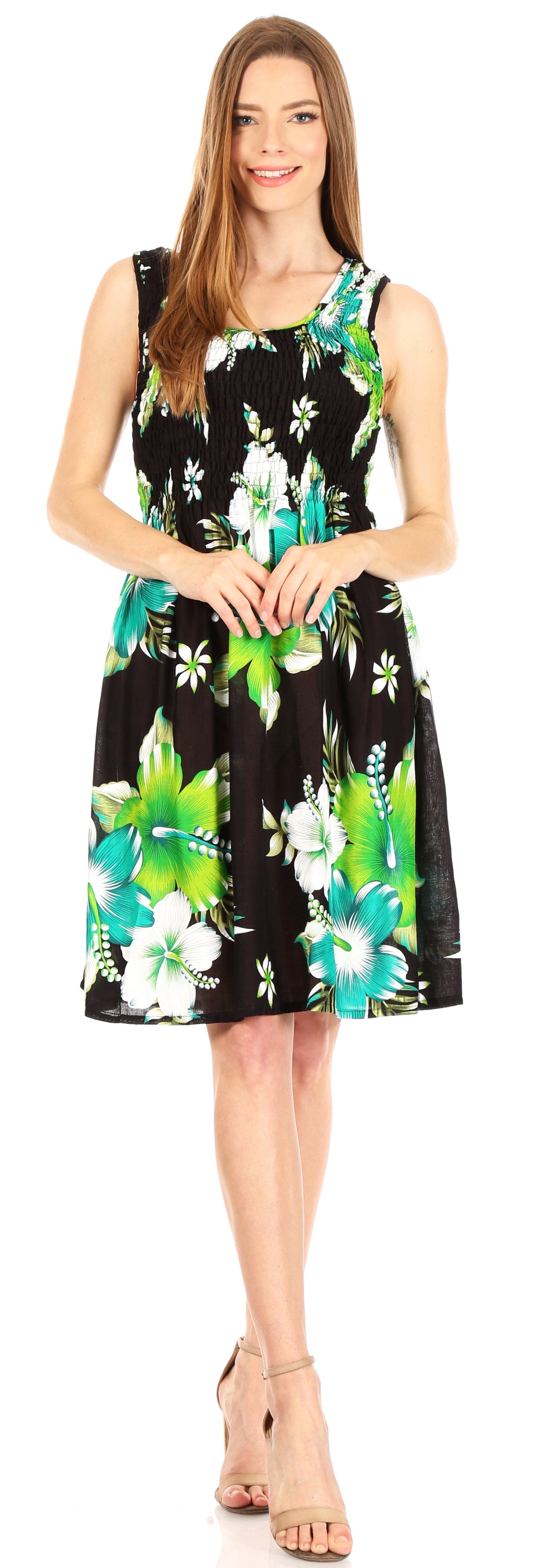 Woman wearing a sleeveless dress with floral pattern on a white background