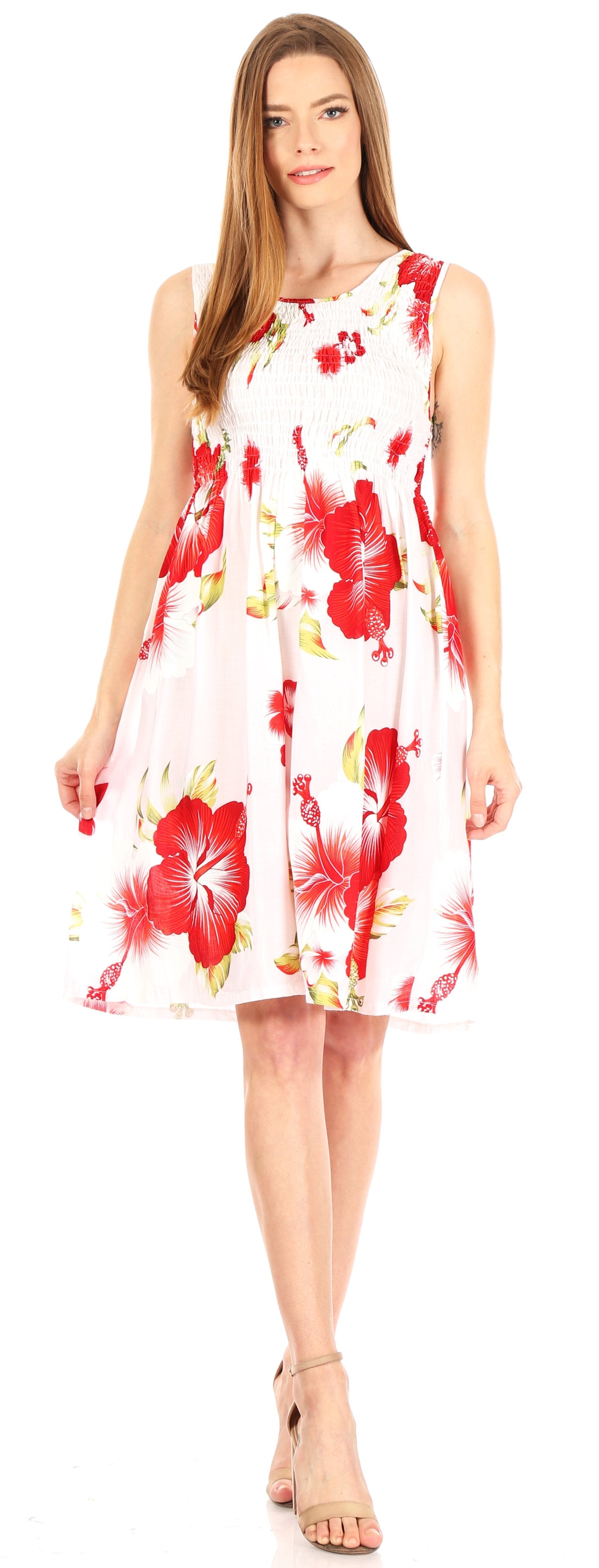 Woman wearing a floral dress with red flowers on a white background