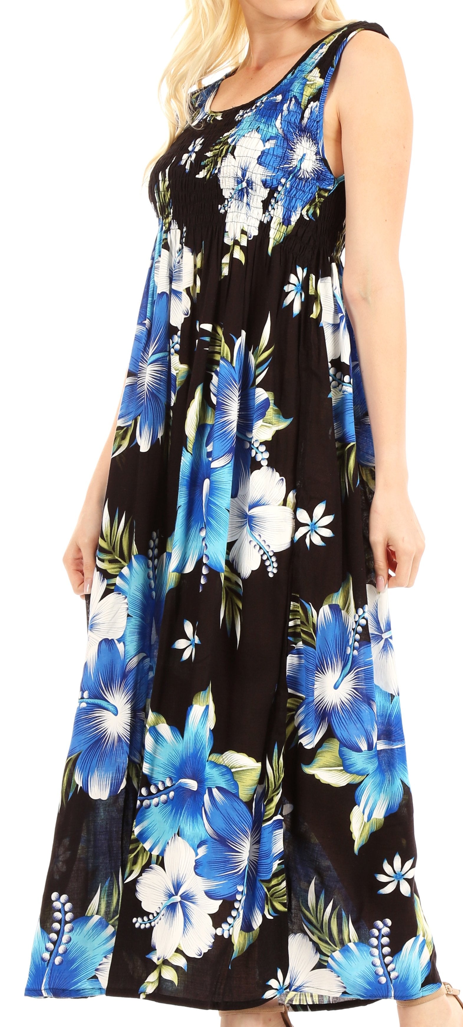 Woman wearing a black sleeveless dress with blue floral pattern