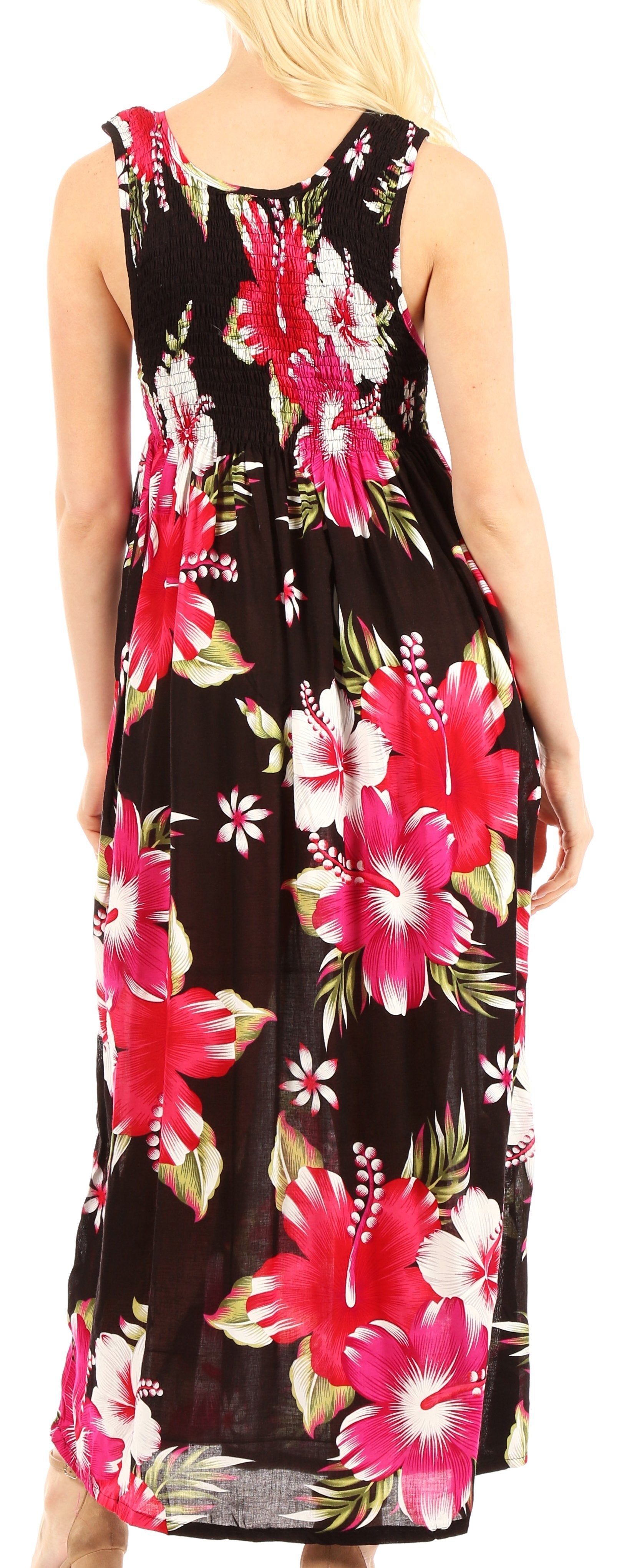 Woman wearing a floral dress with pink and white flowers on a black background