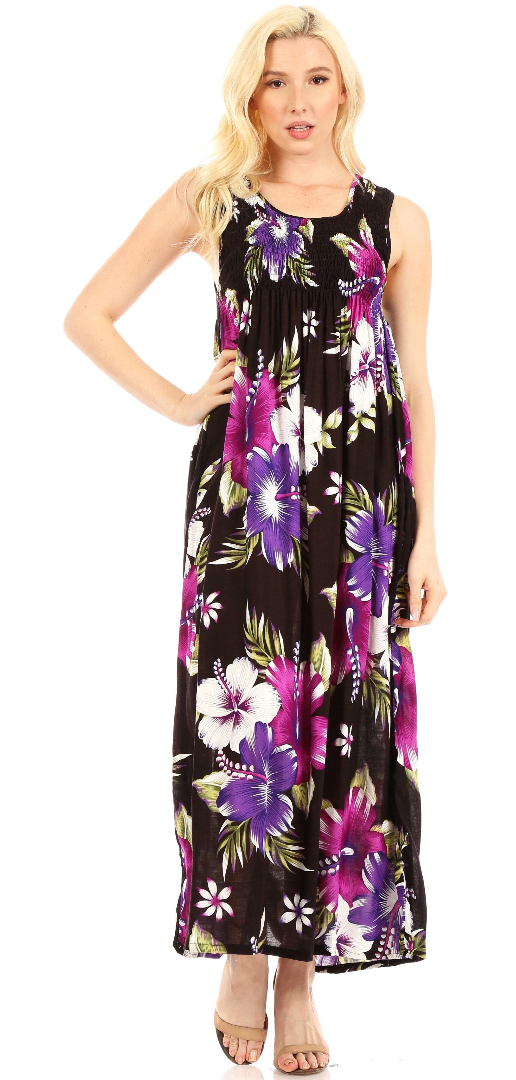 Woman wearing a black floral maxi dress on a white background