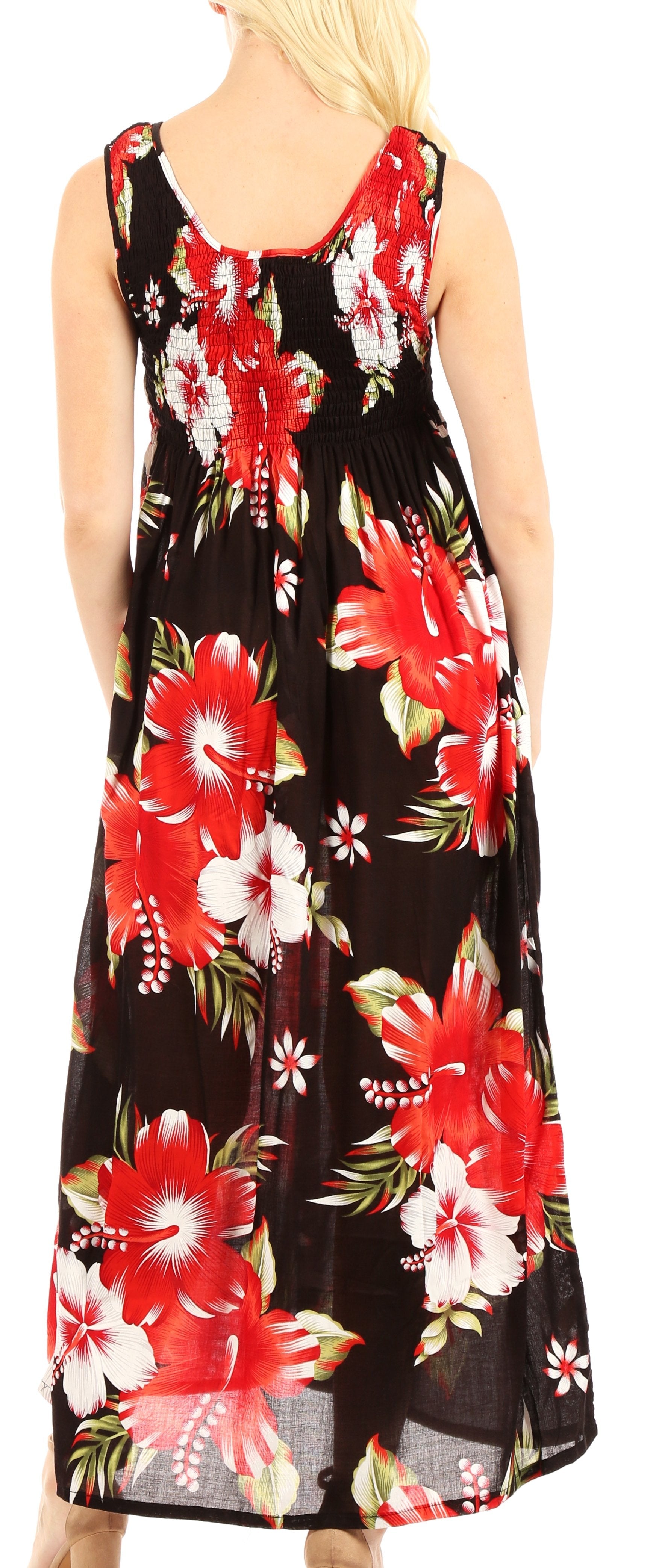 Woman wearing a sleeveless dress with red floral pattern on a black background