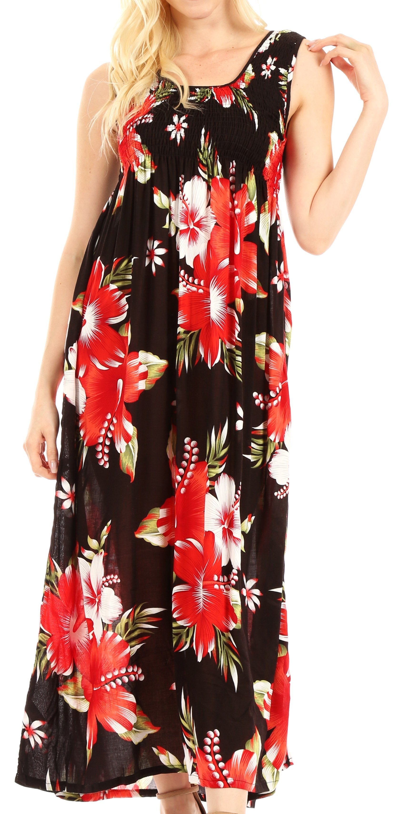 Woman wearing a black floral dress with red and white flowers on a white background