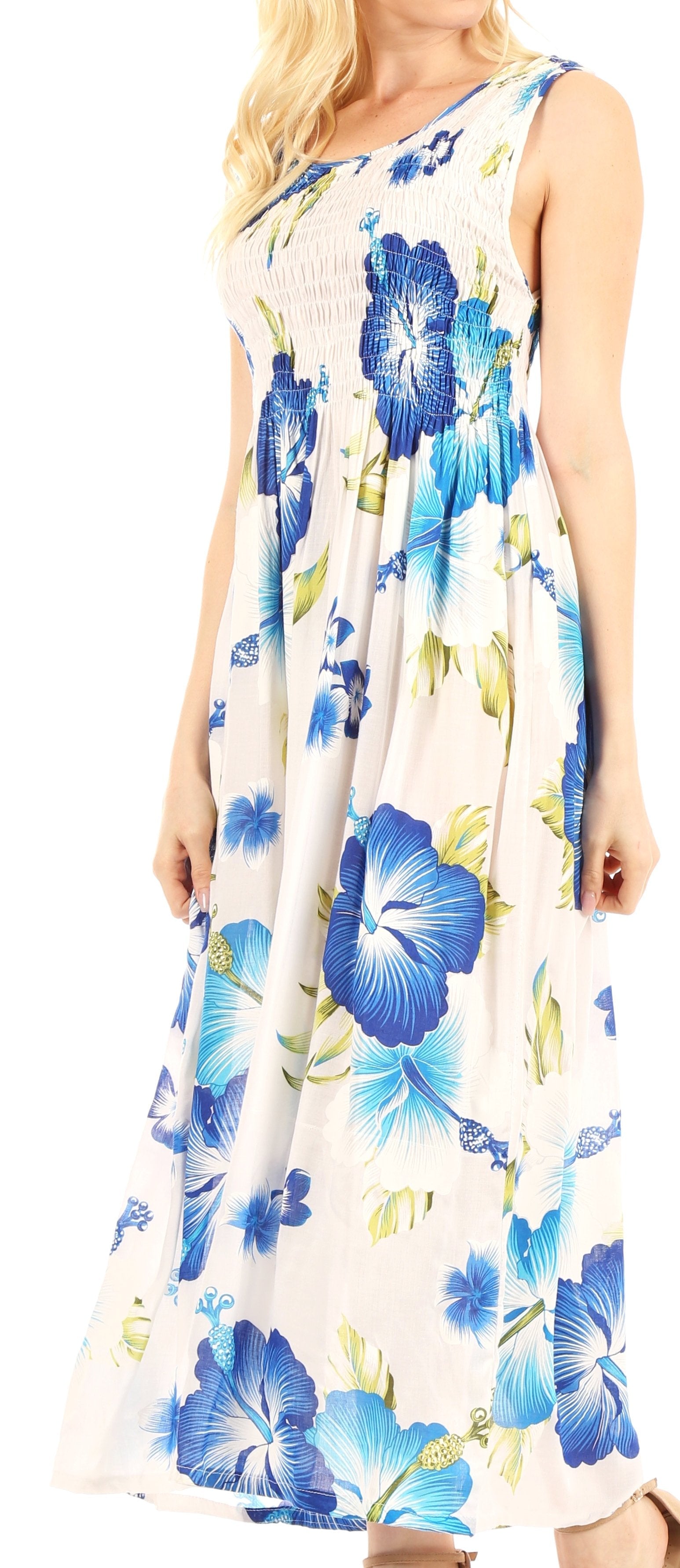Woman wearing a floral dress with blue flowers on a white background