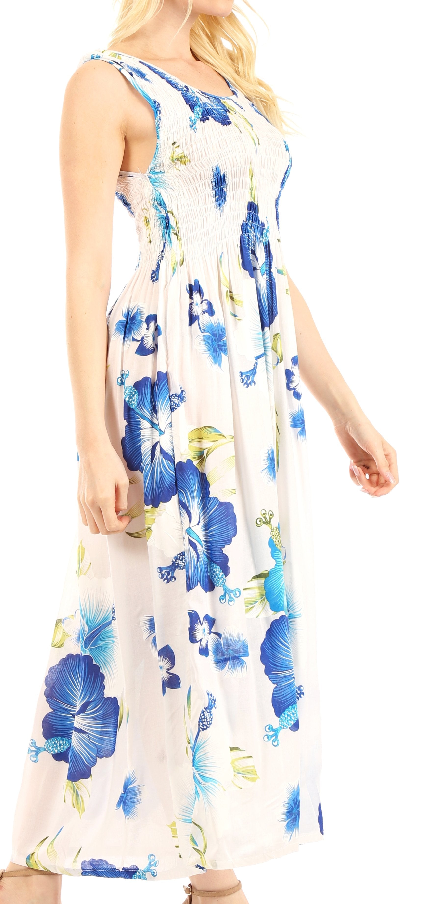 Woman wearing a floral dress with blue flowers on a white background