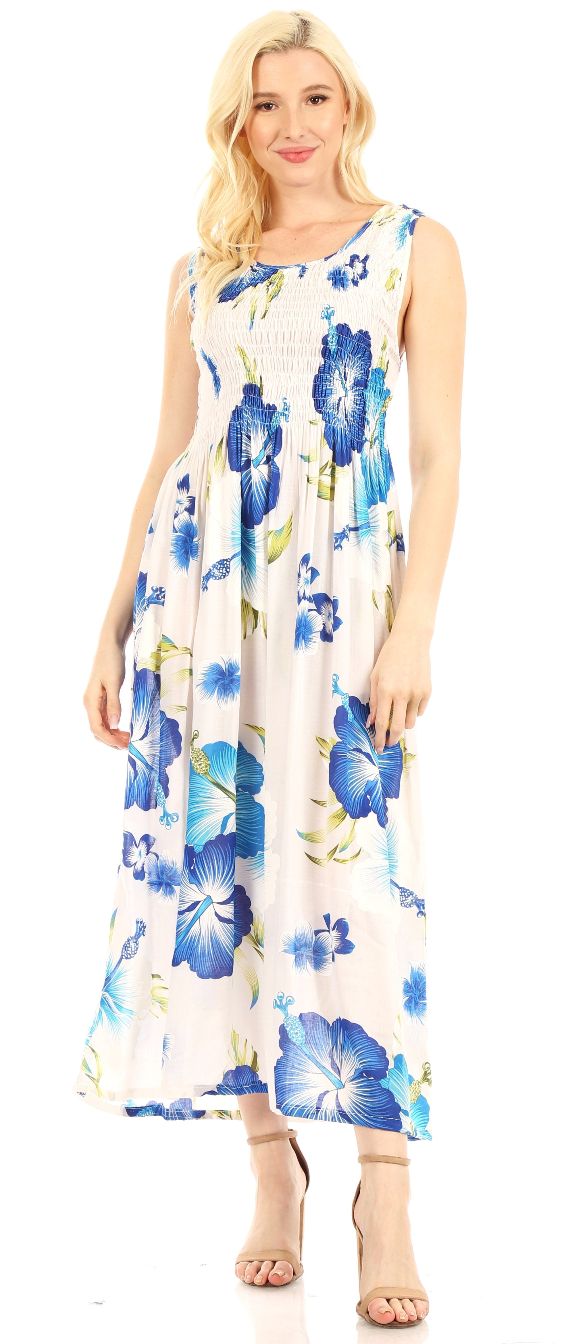 Woman wearing a floral dress with blue flowers on a white background