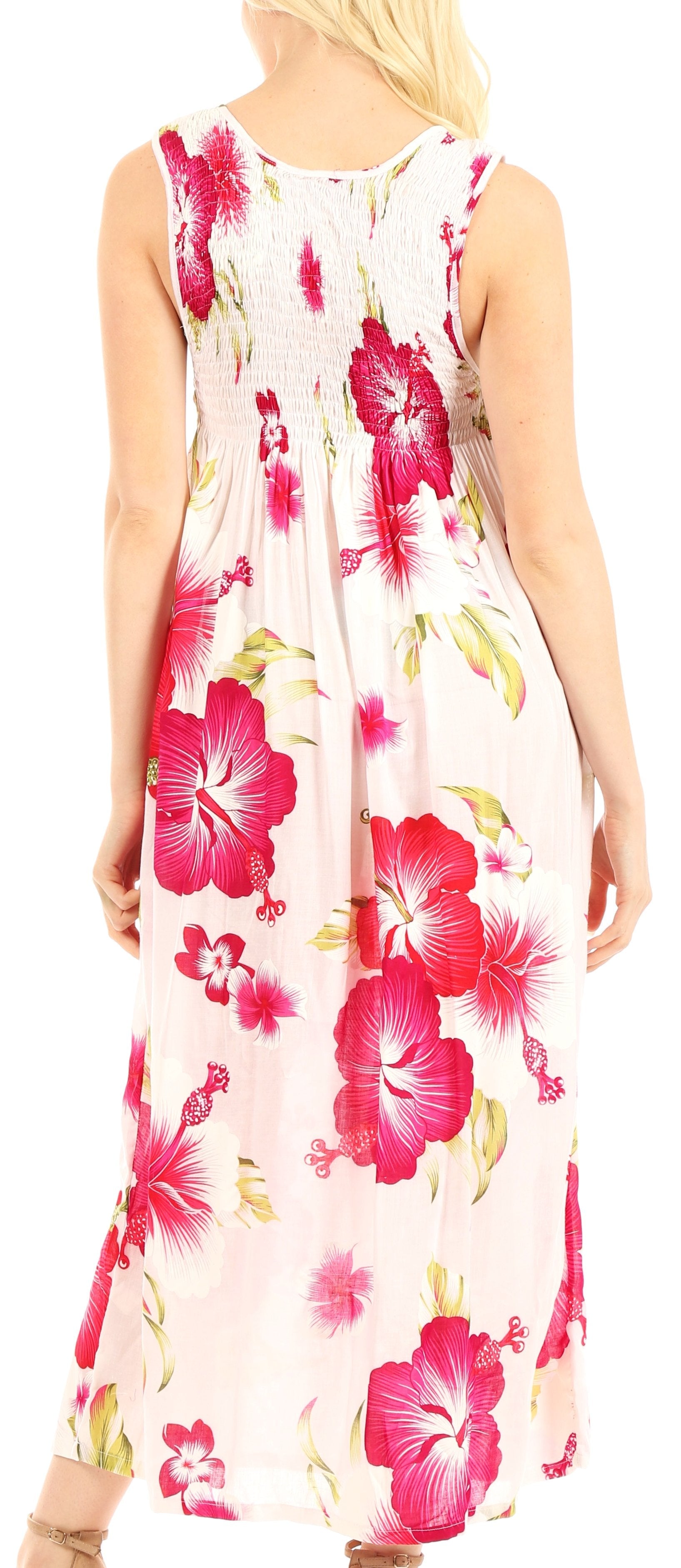 Woman wearing a floral dress with pink flowers on a white background