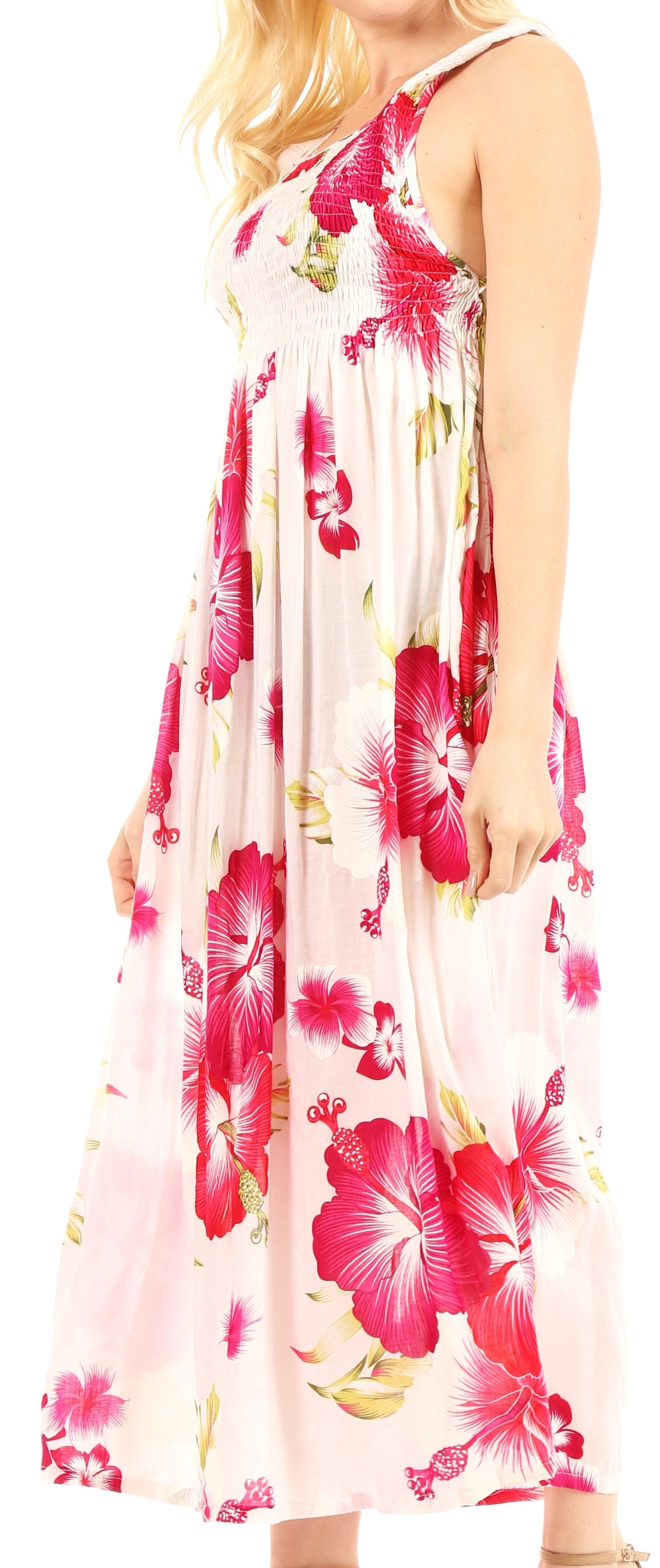 Woman wearing a floral dress with pink flowers on a white background