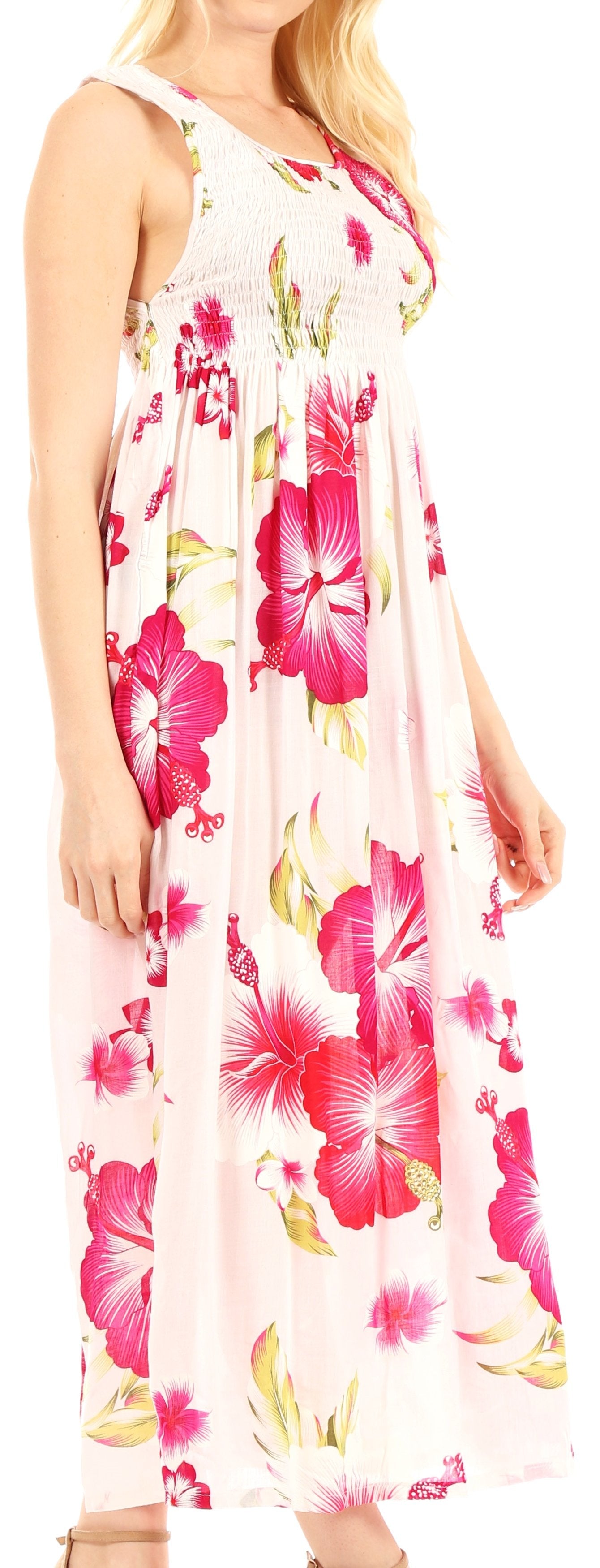 Woman wearing a floral dress with pink flowers on a white background