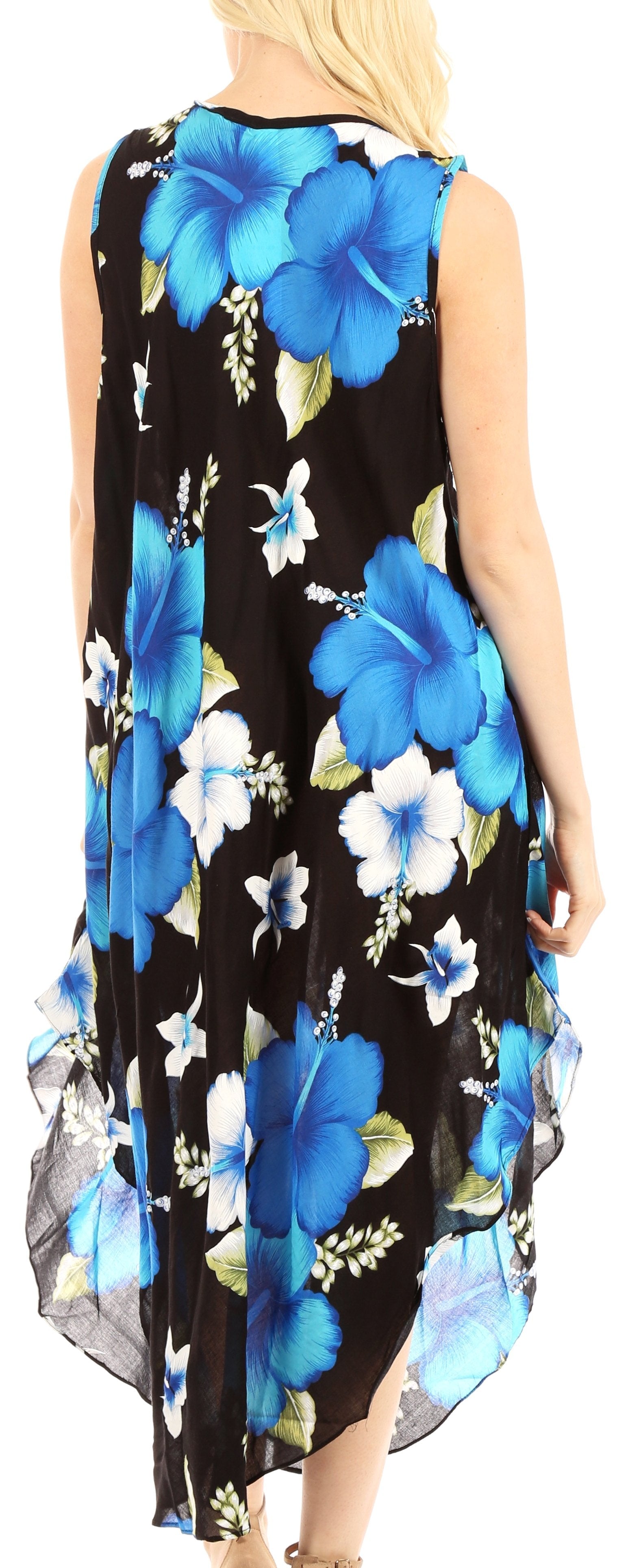 Woman wearing a sleeveless dress with blue floral pattern on black background
