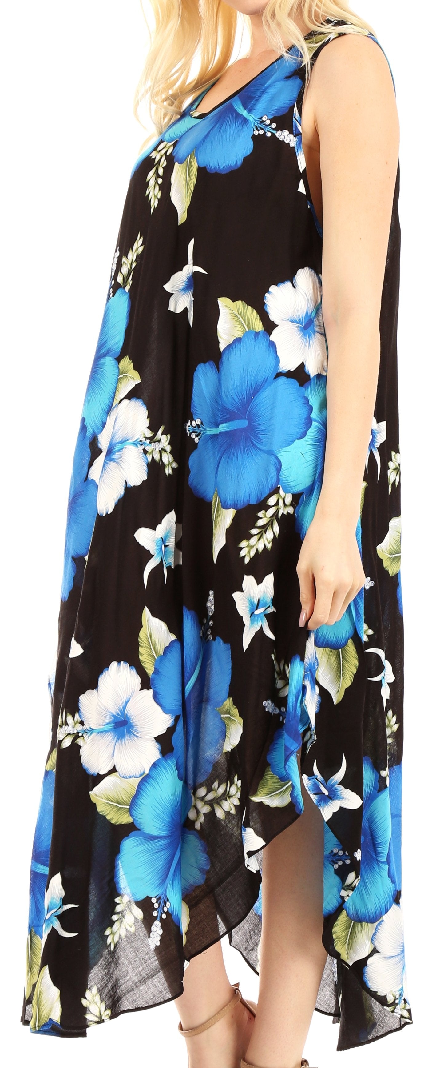 Woman wearing a black sleeveless dress with blue floral pattern