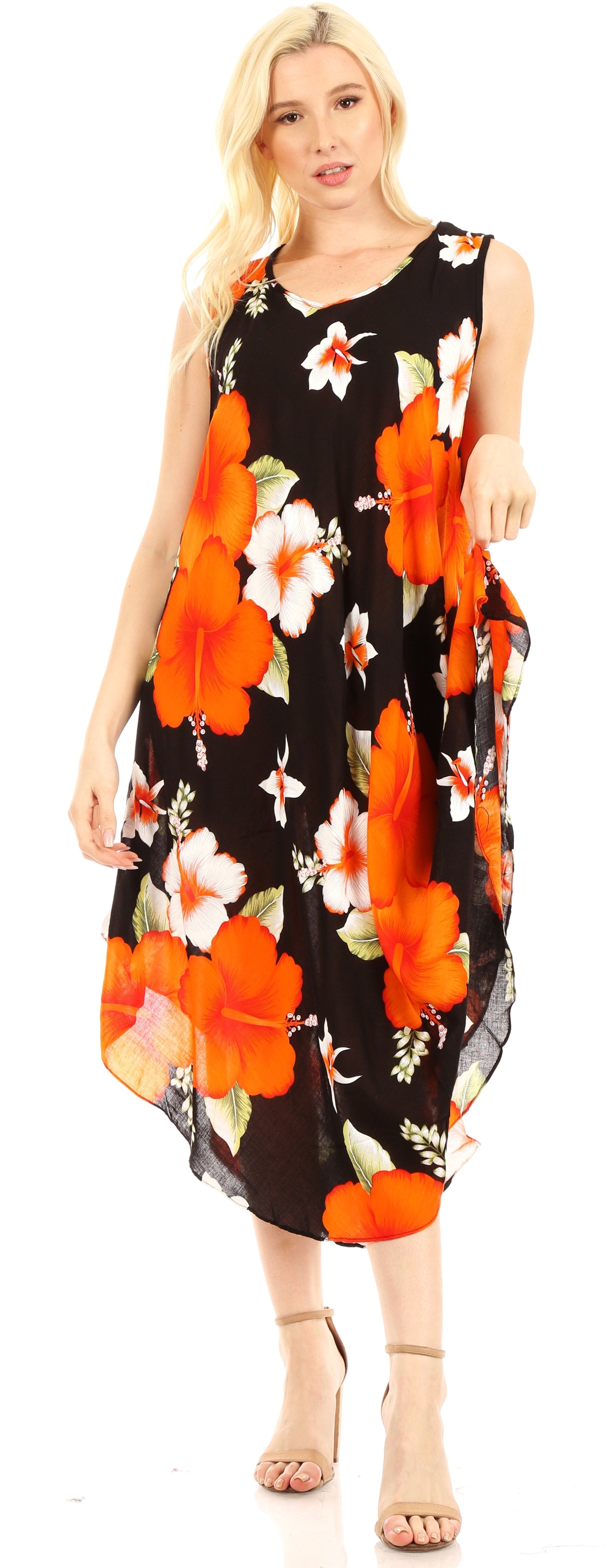 Woman wearing a black floral dress with orange flowers on a white background