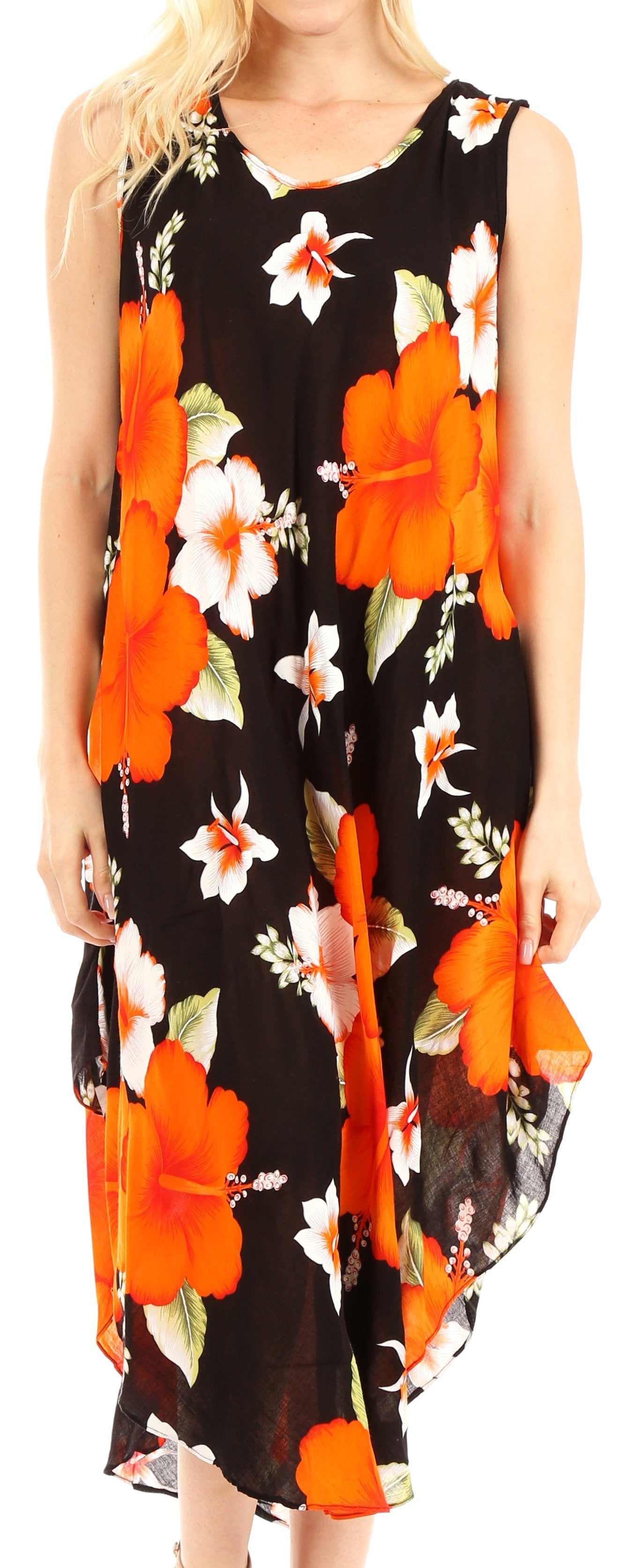 Woman wearing a sleeveless dress with orange floral pattern on black background