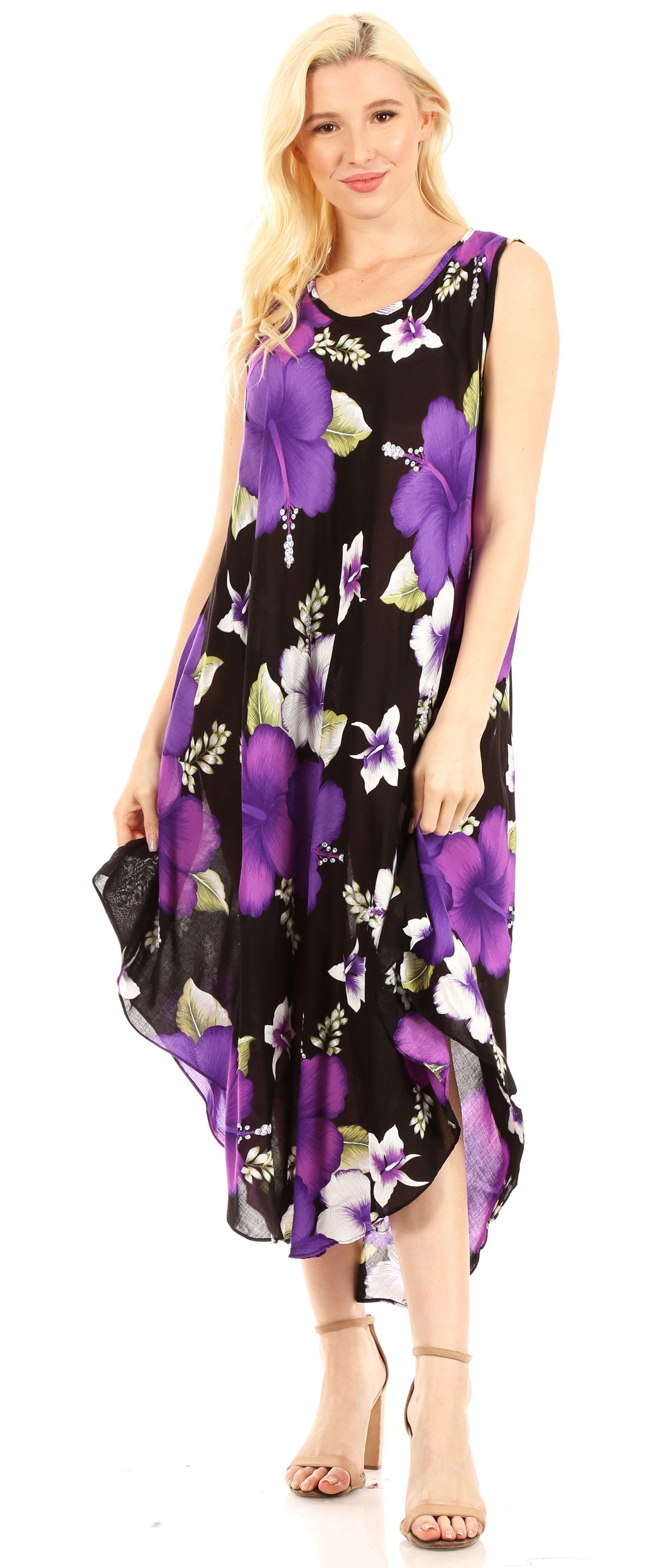 Woman wearing a purple floral dress on a white background