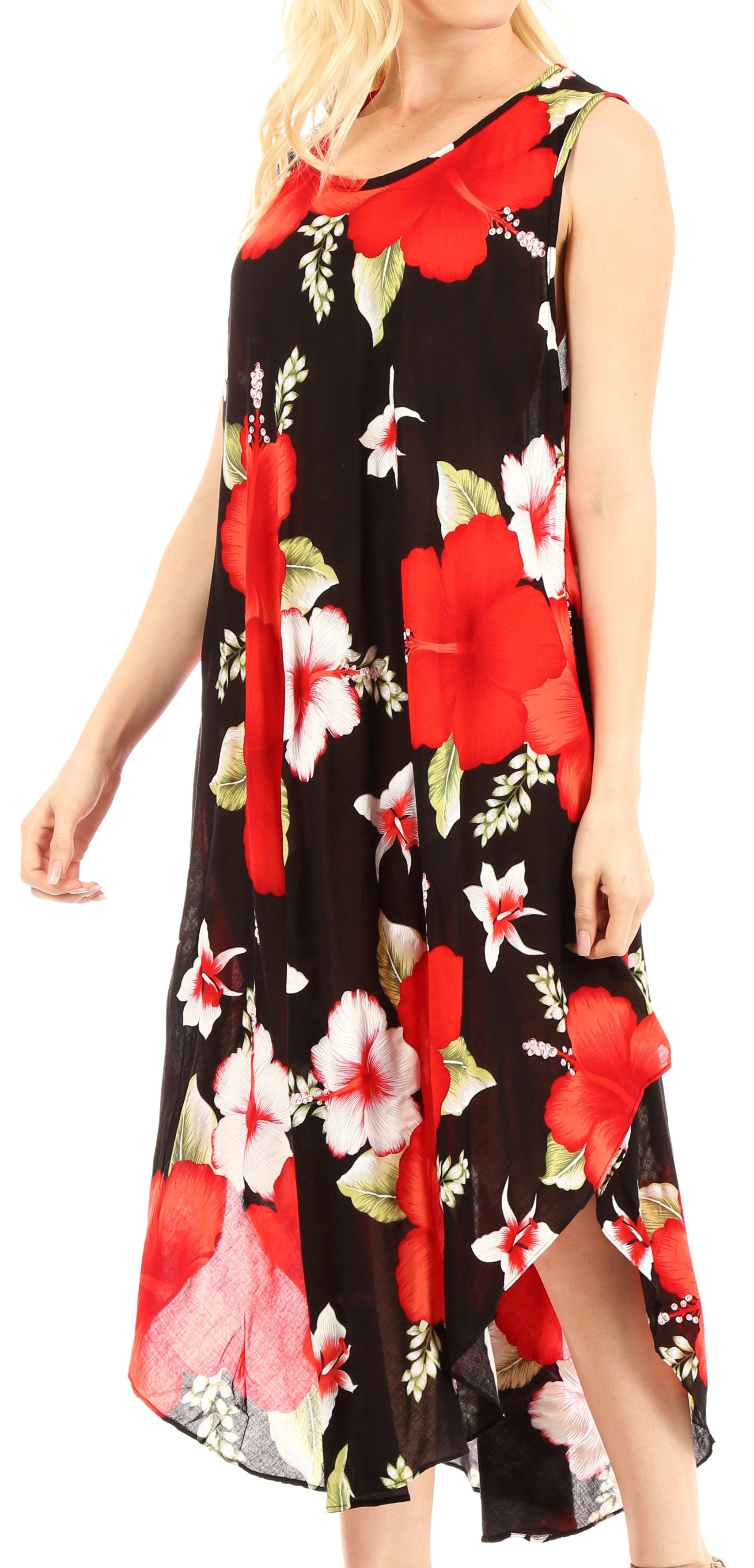 Woman wearing a black floral dress with red flowers on a white background