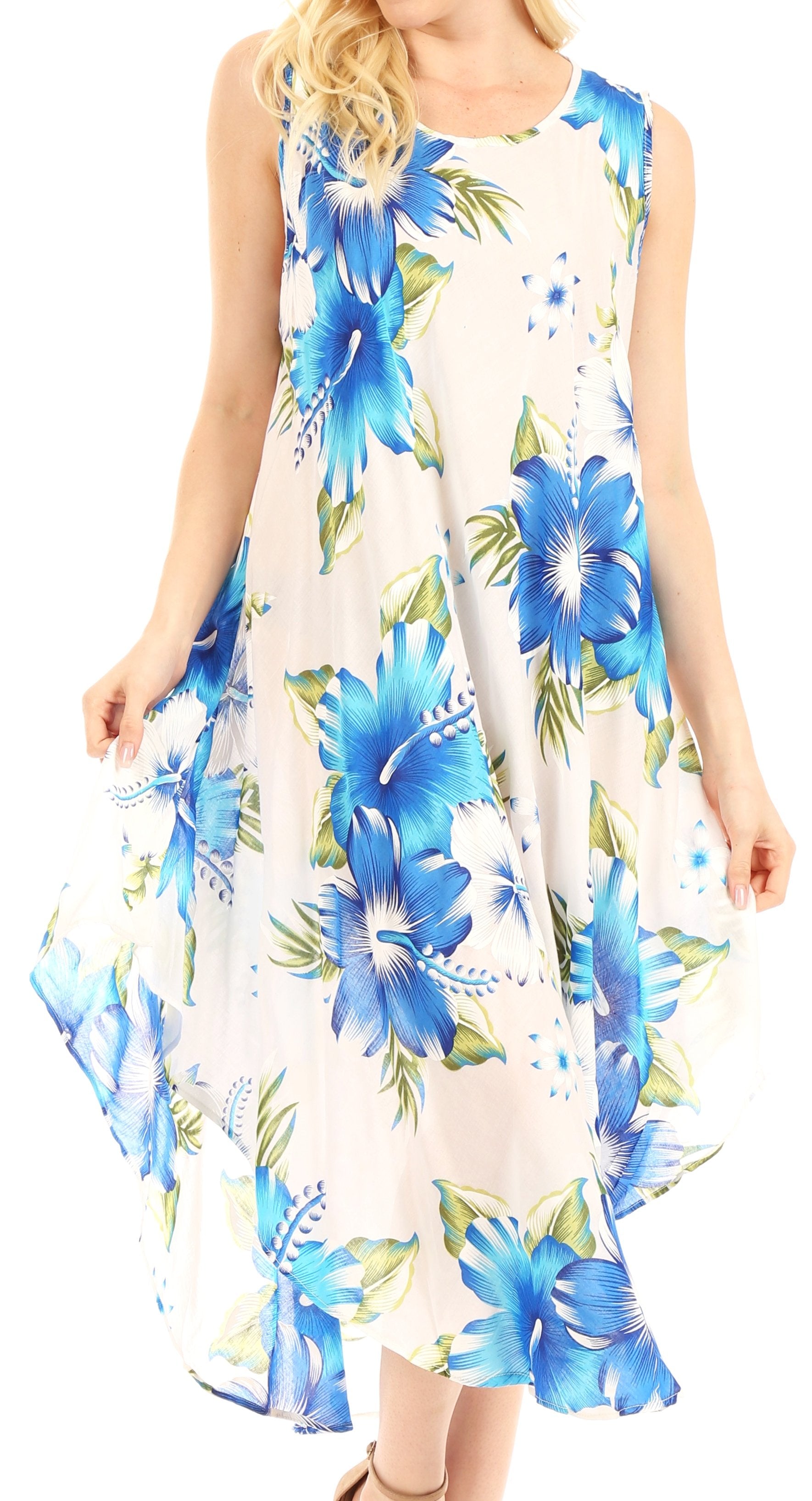 Woman wearing a sleeveless dress with blue floral pattern on a white background