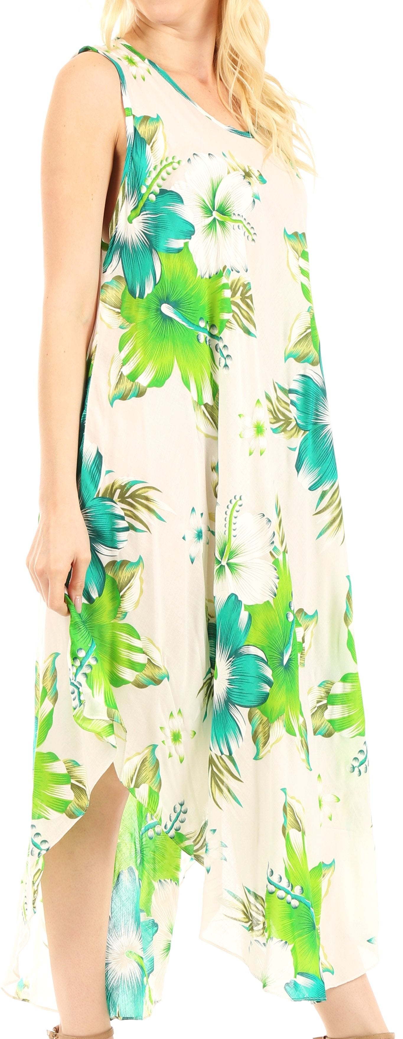 Woman wearing a sleeveless dress with tropical leaf pattern on a white background