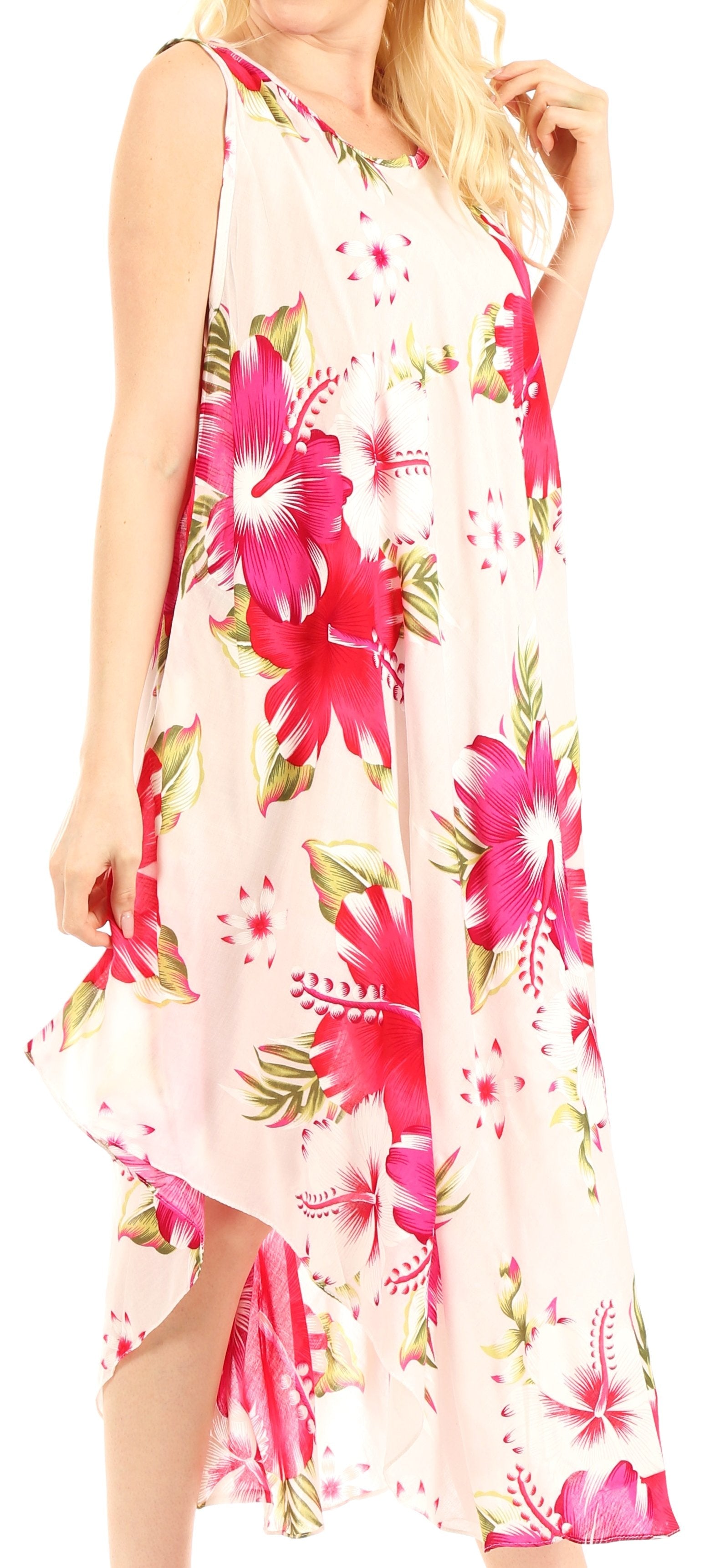 Woman wearing a floral dress with pink flowers on a white background